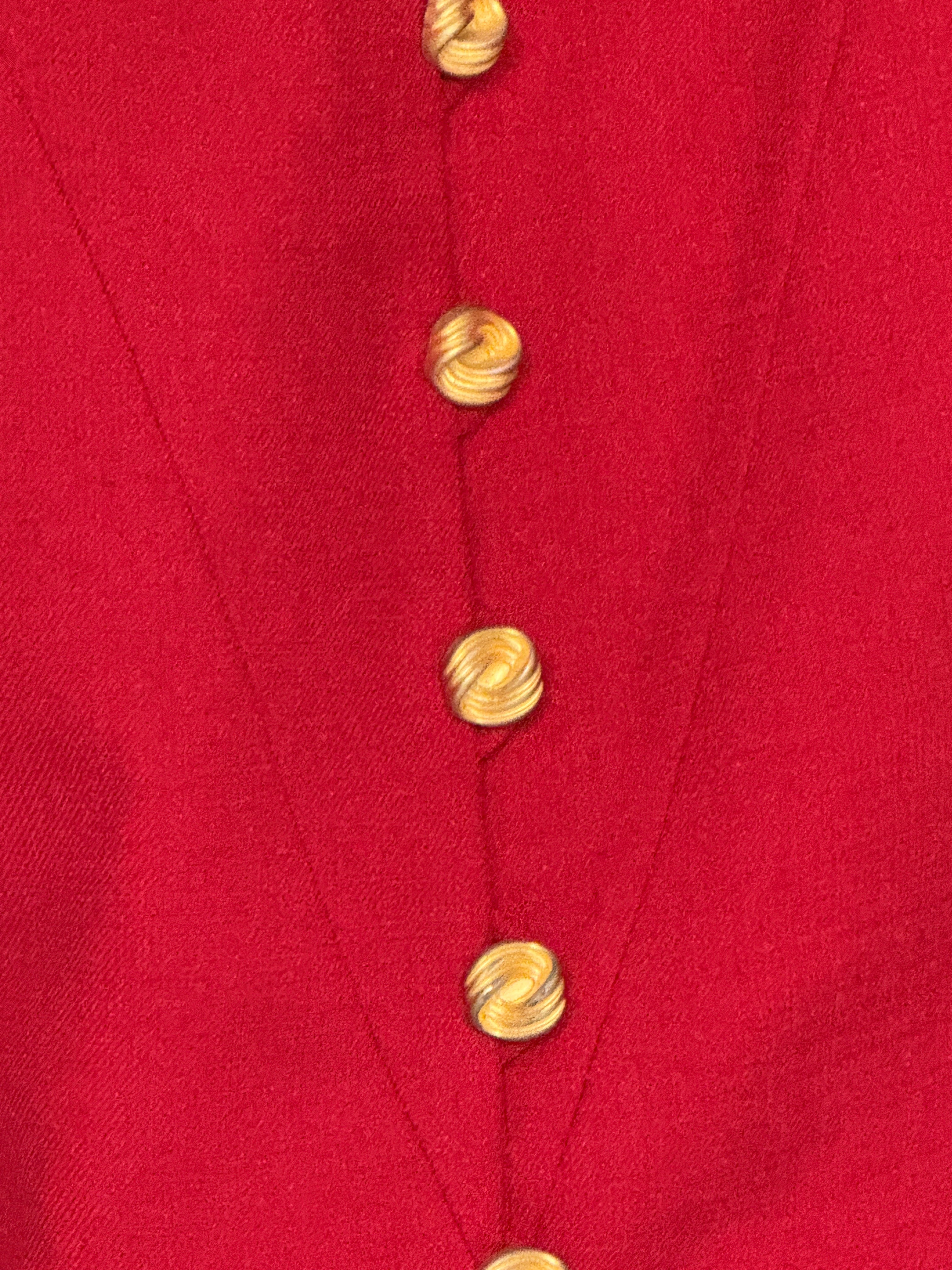 Vintage red structured blazer fabric close-up