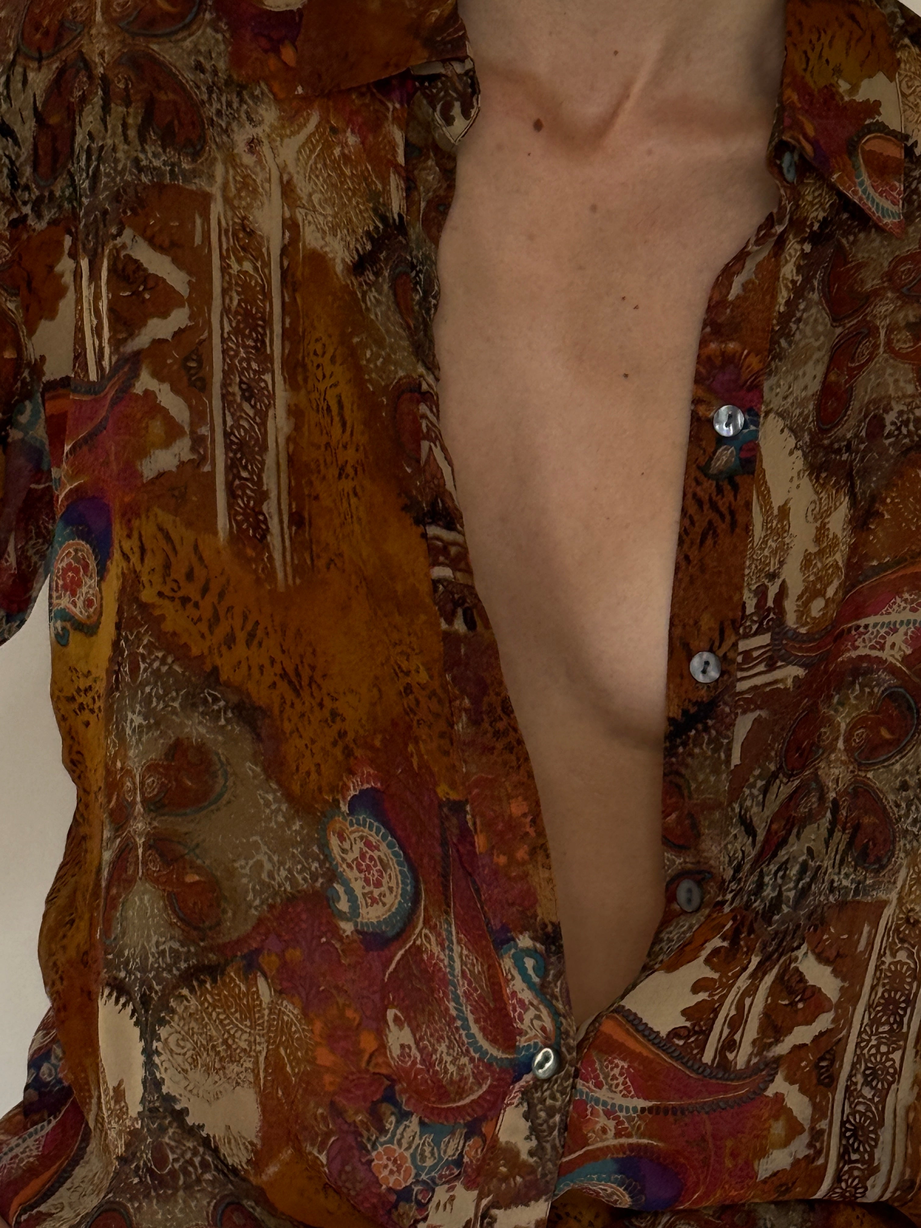 Vintage silk paisley fabric close-up