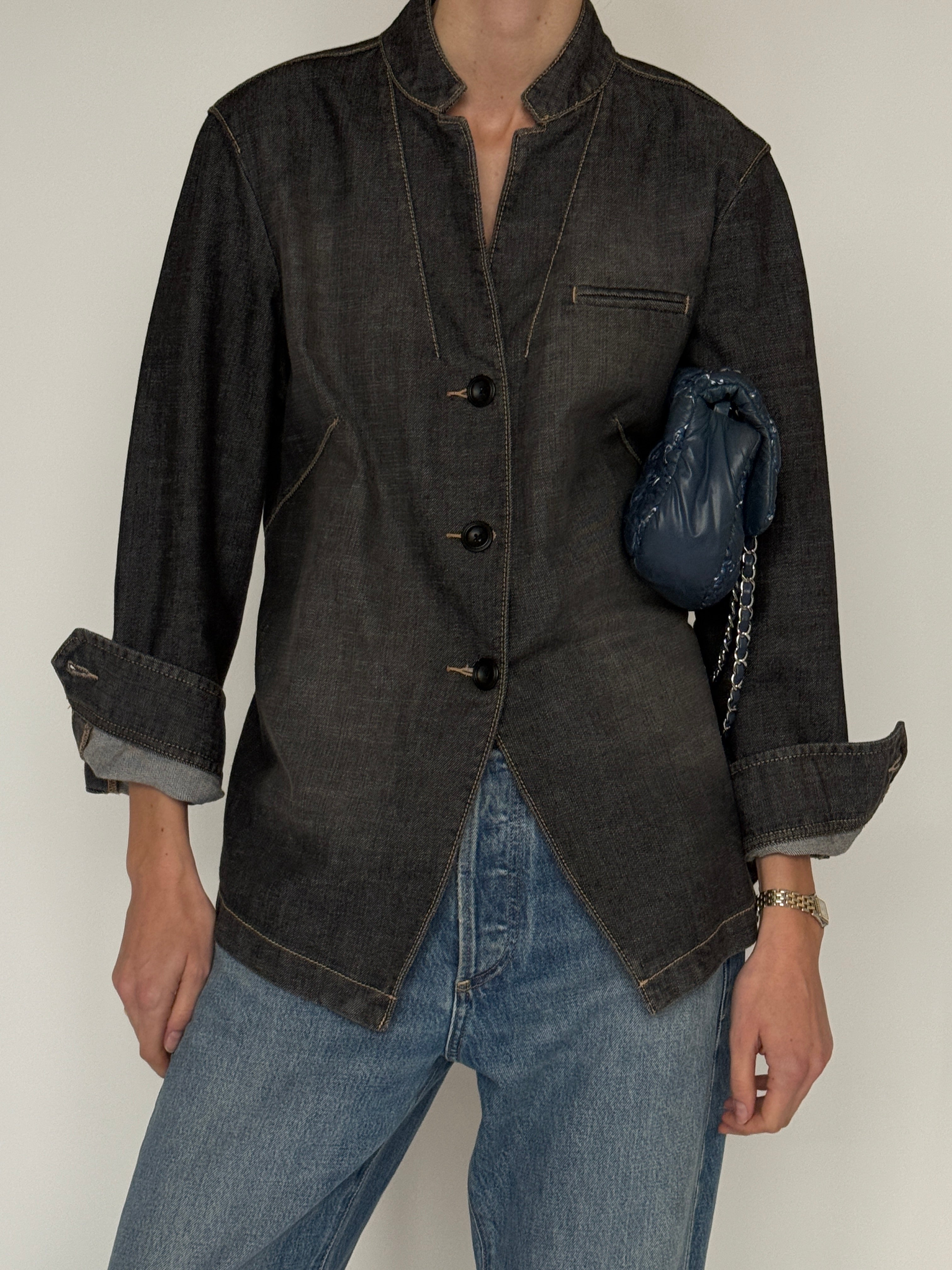 Vintage charcoal blazer fabric texture close-up