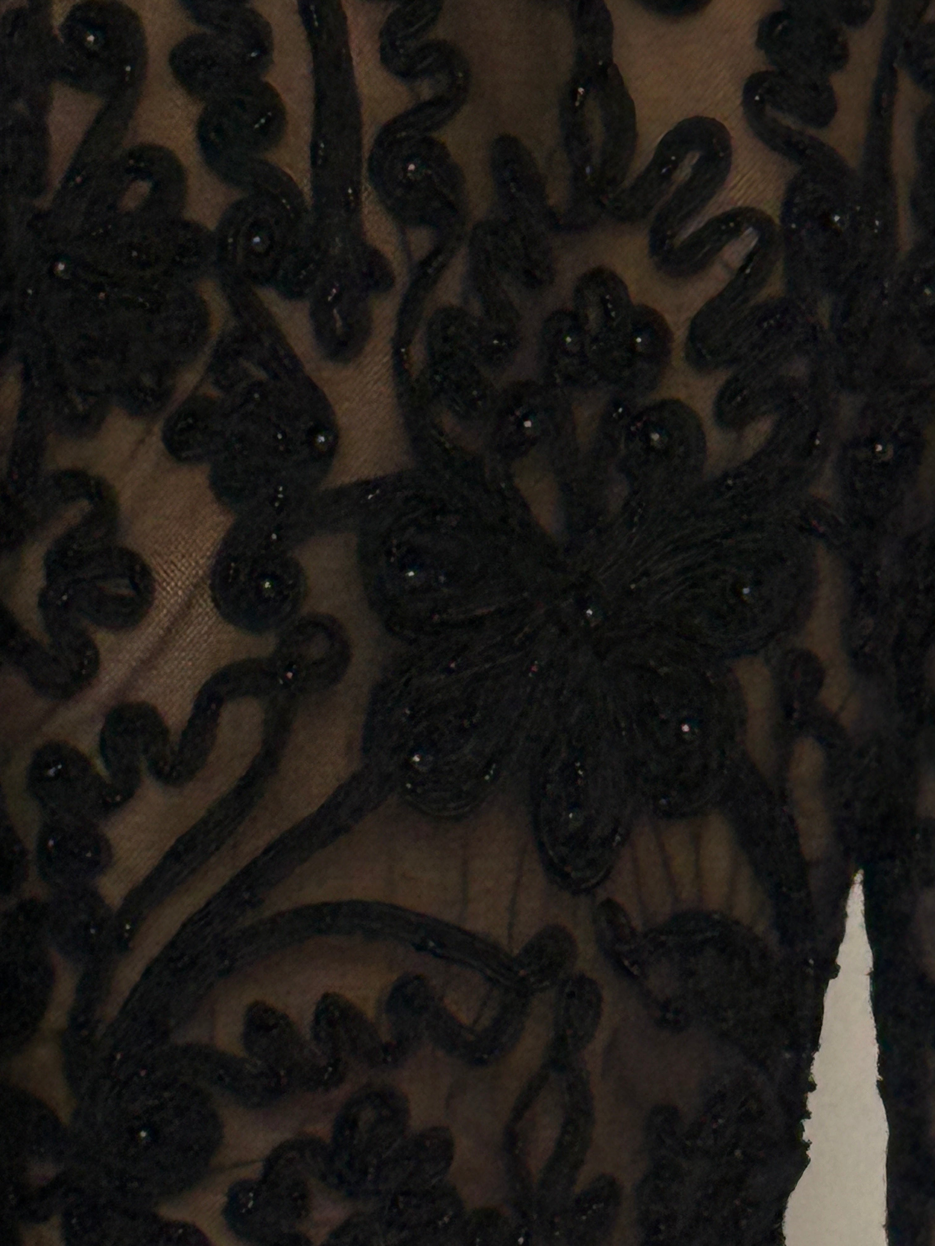 Vintage sheer embroidered mesh top black fabric close-up