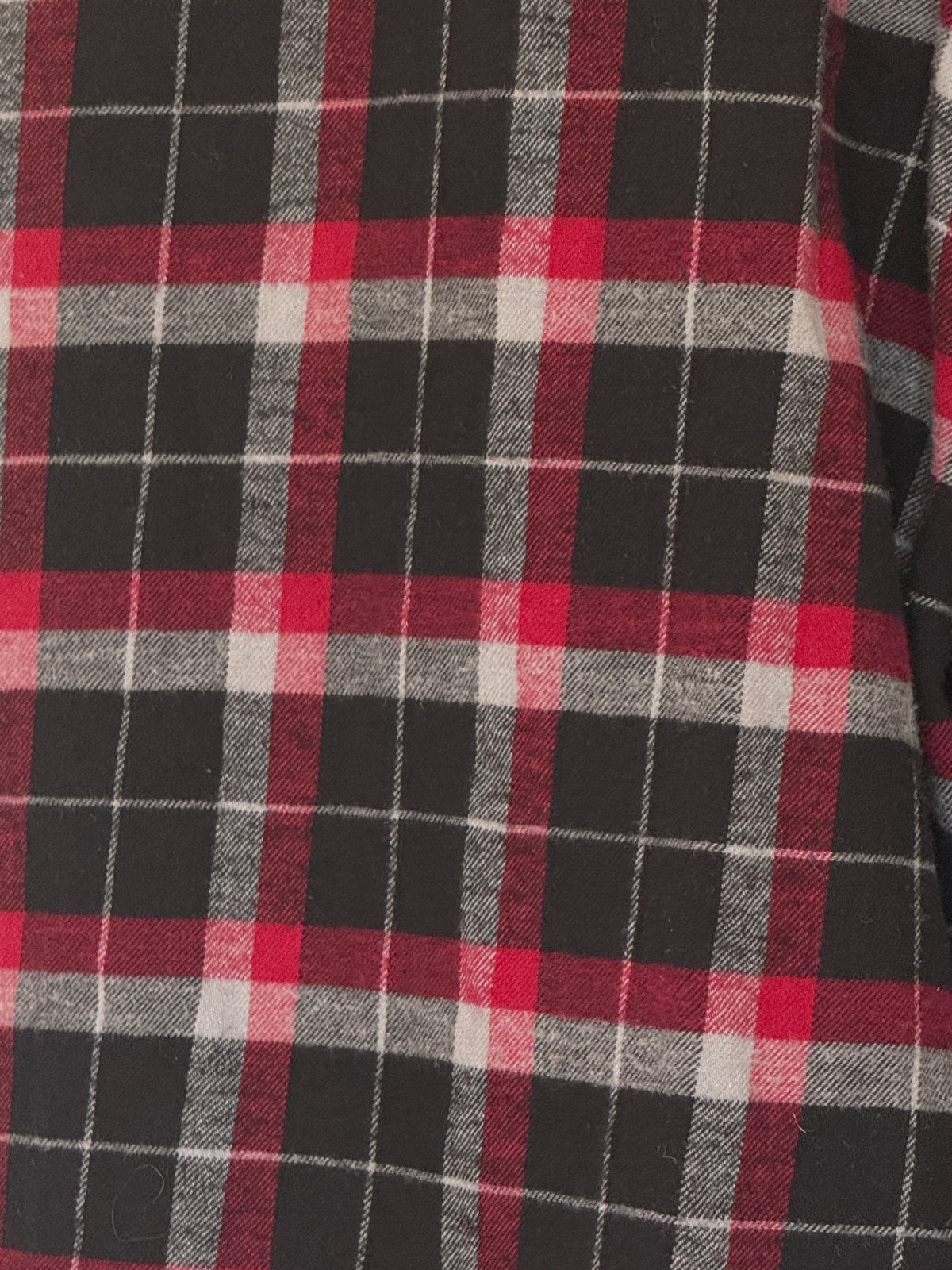Vintage western plaid shirt black red and grey fabric close-up
