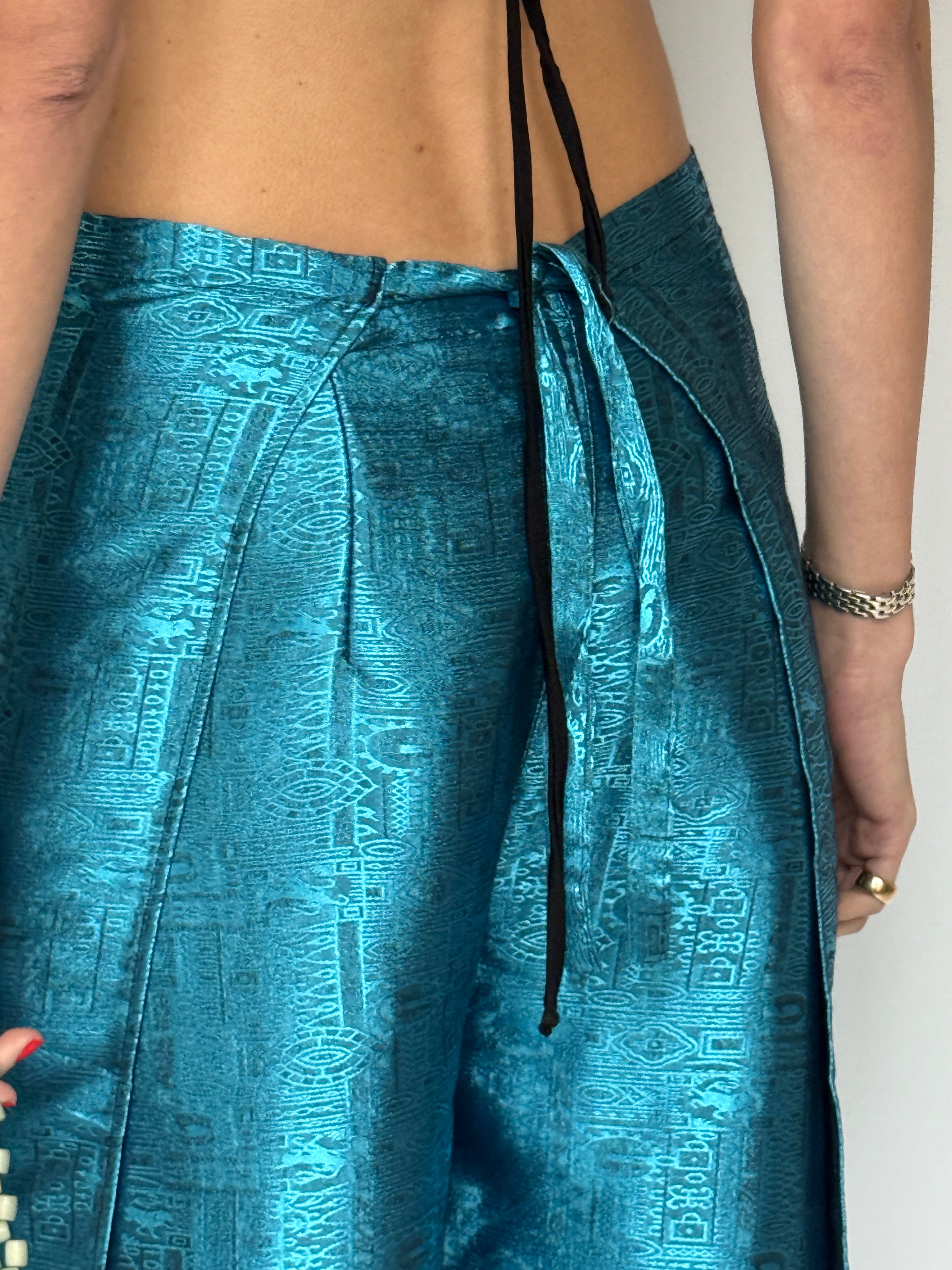 Vintage metallic wrap trousers back view close-up
