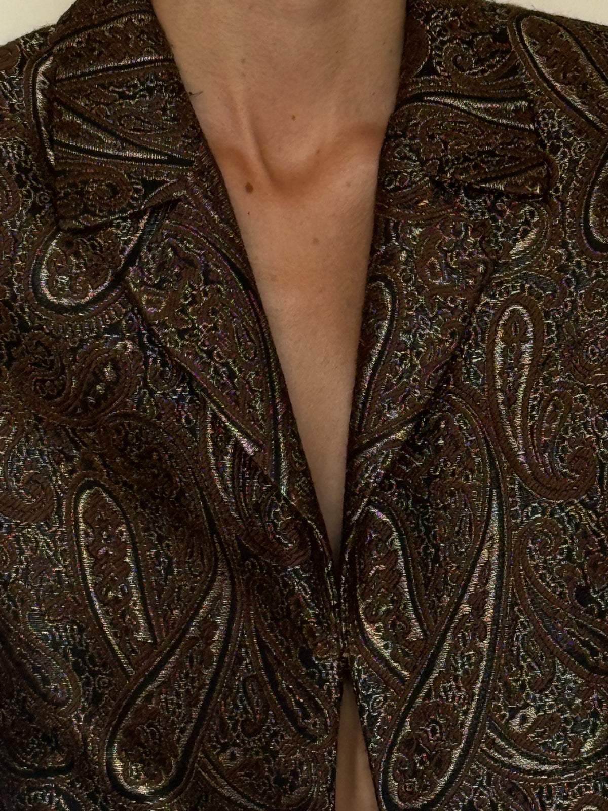 Vintage paisley brocade blazer brown fabric and lapel close-up