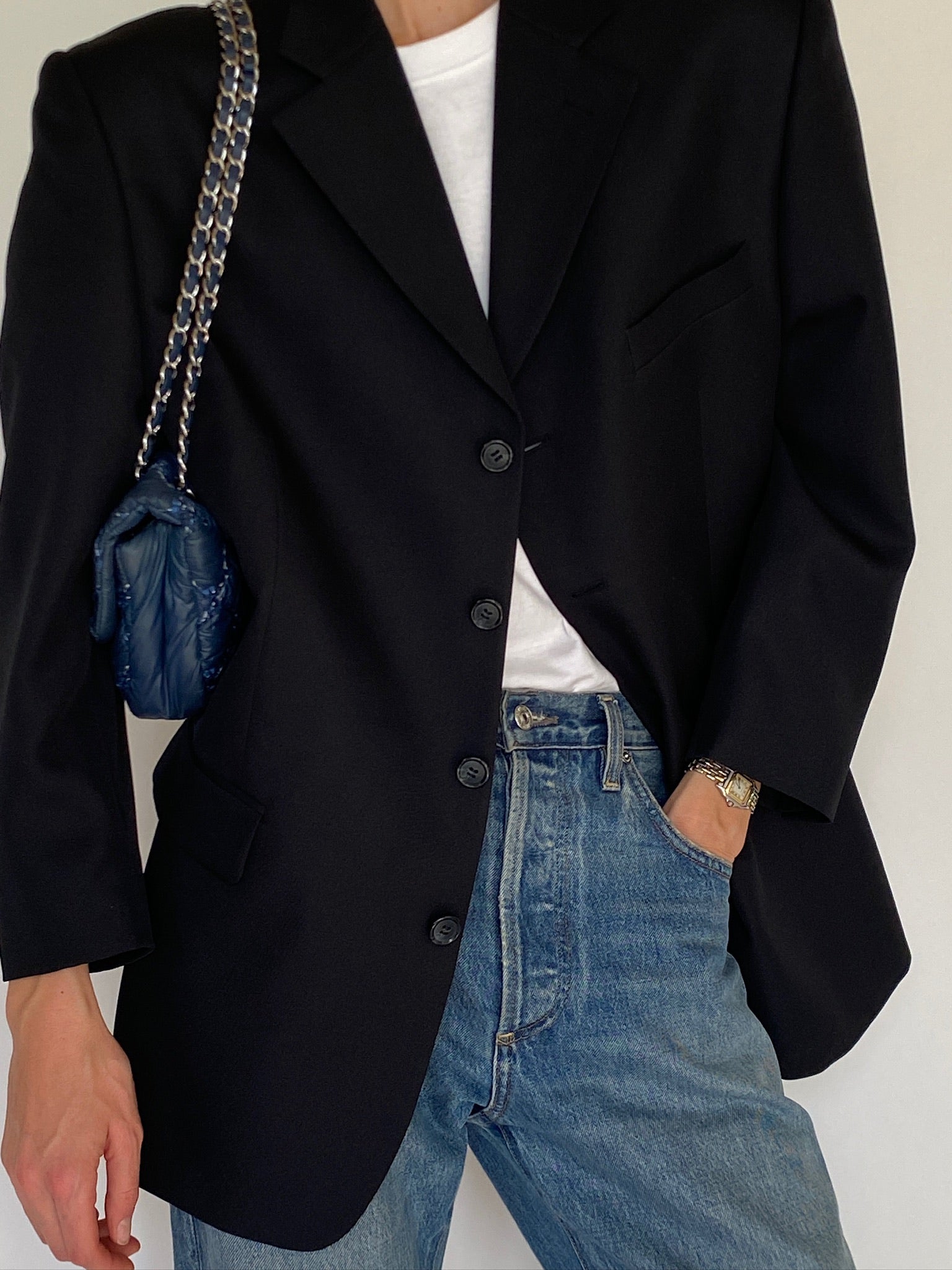 Vintage black structured blazer fabric close-up