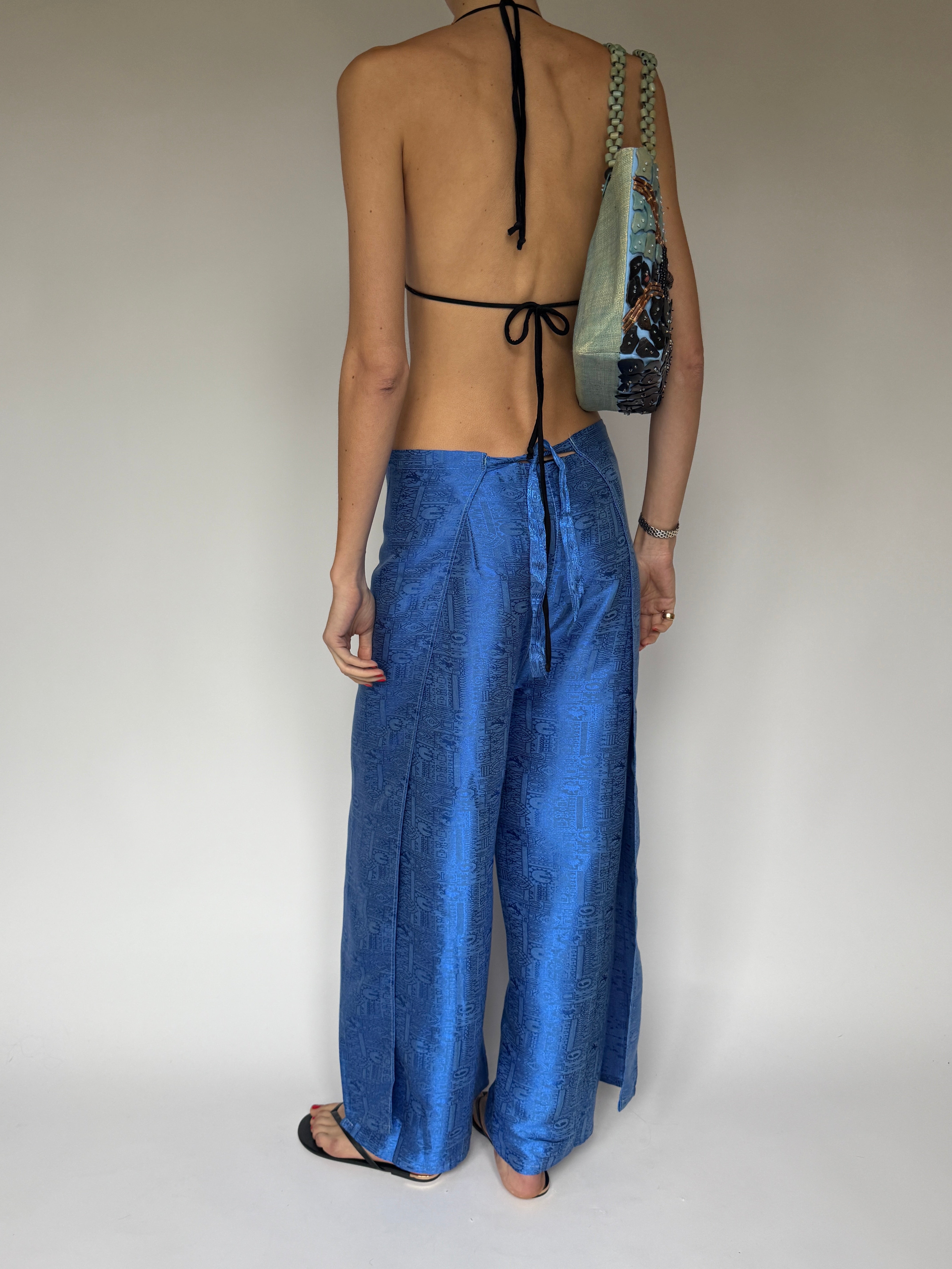 Vintage textured jacquard trousers featuring relaxed wide leg blue back view