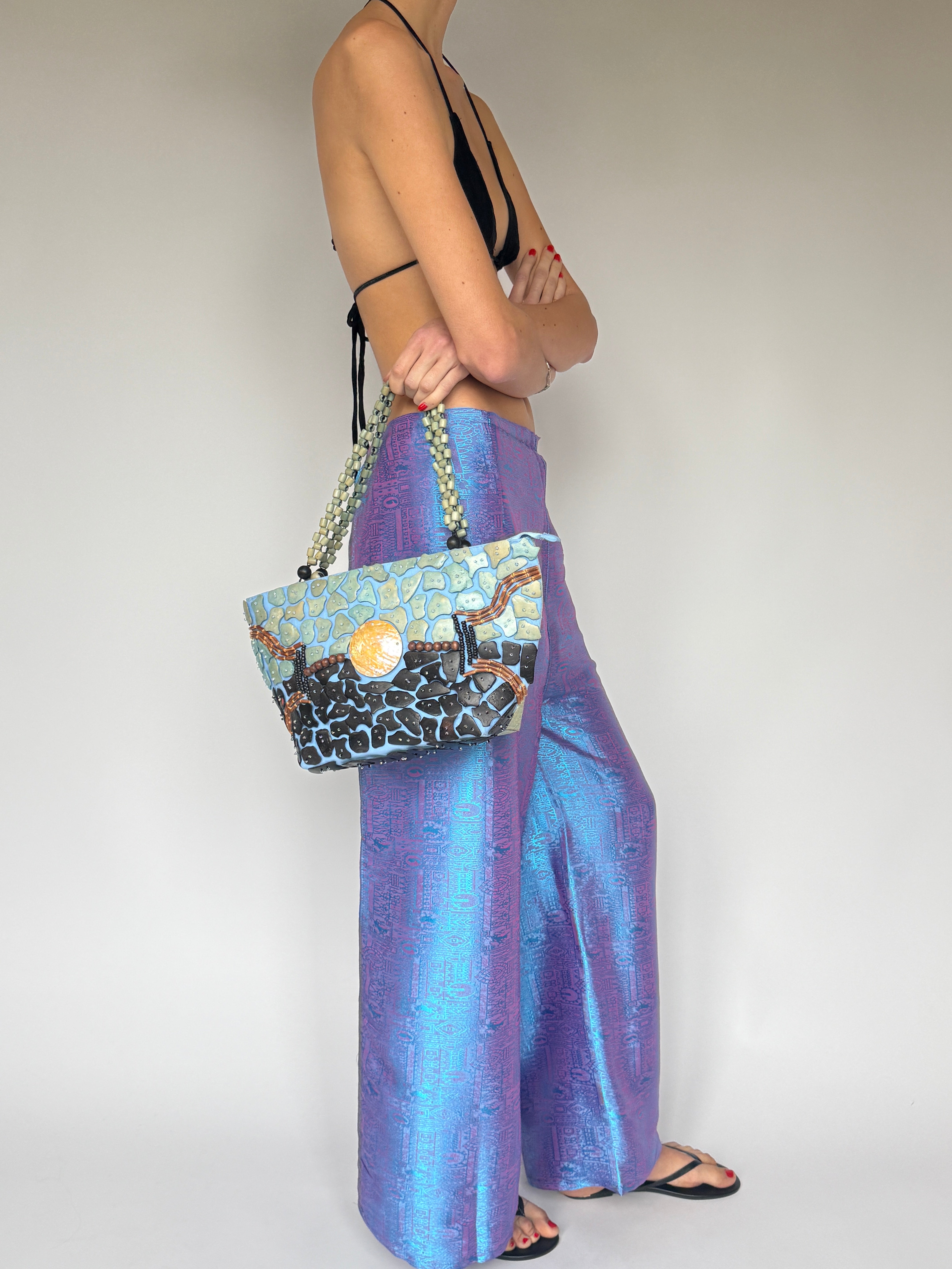 Vintage wrap trousers with iridescent jacquard pattern in purple blue