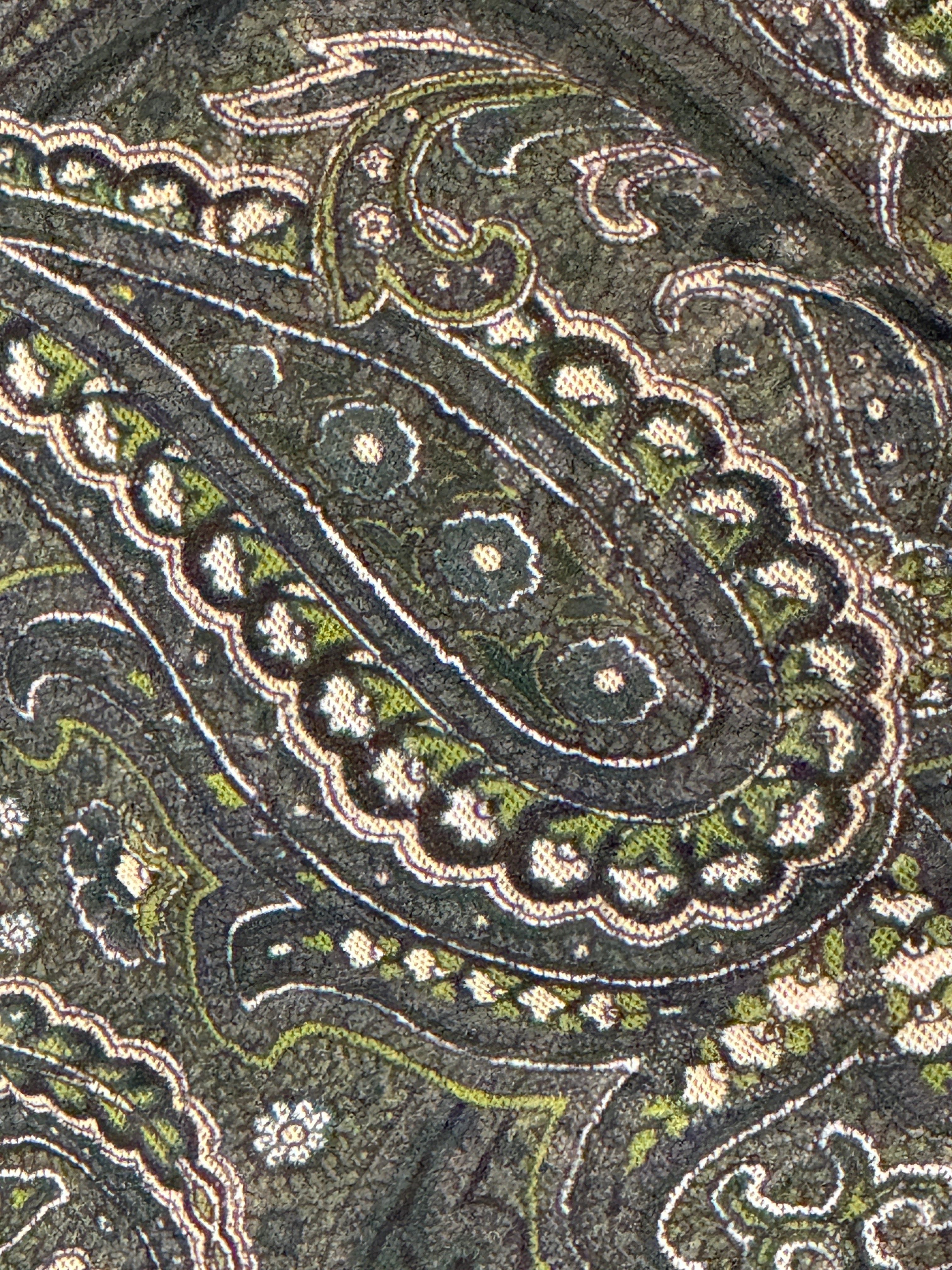 Vintage paisley mesh fabric close-up