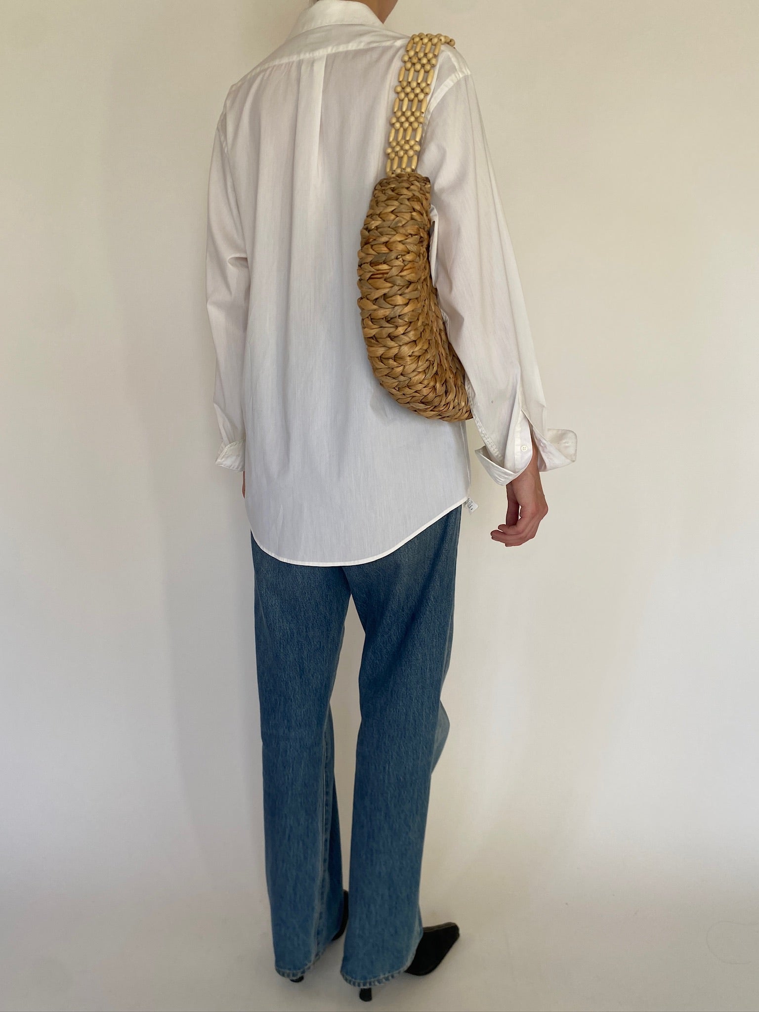 Vintage white button-up shirt back view 