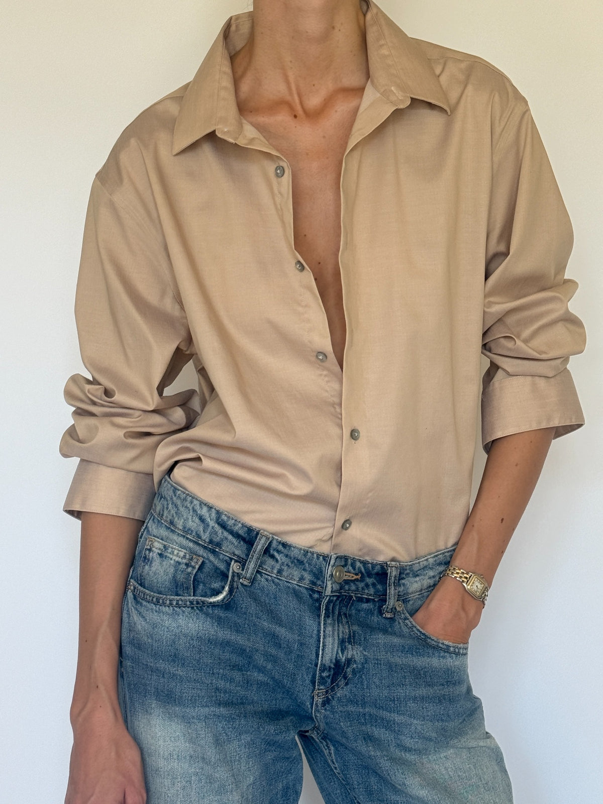 Vintage beige oversized shirt front close-up