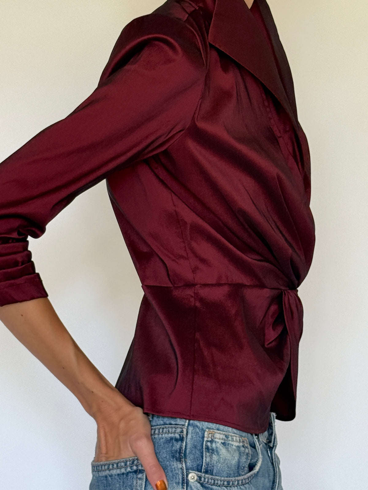 Vintage burgundy wrap blouse side view with peplum silhouette