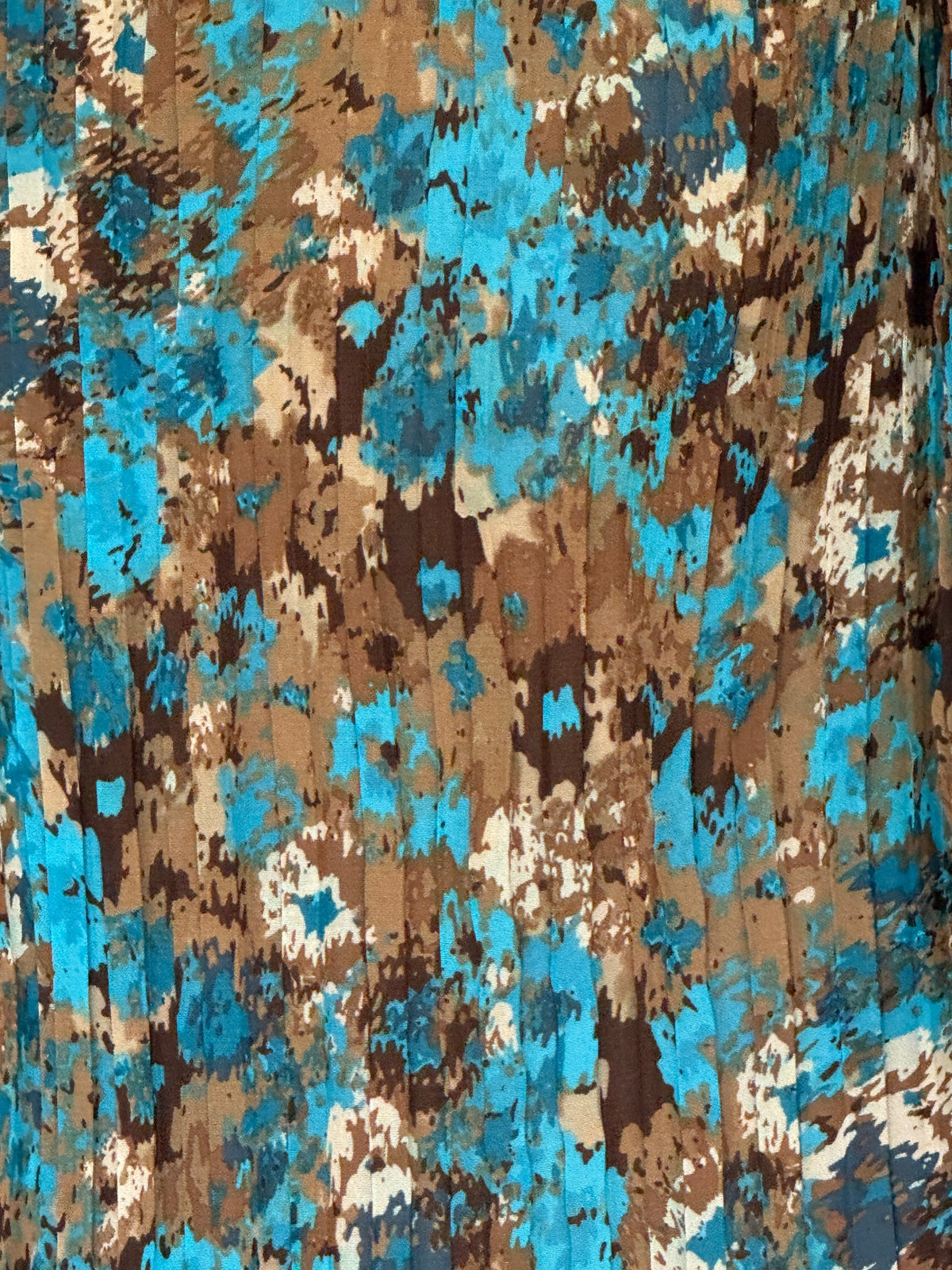 Vintage ruffle blouse abstract print close-up