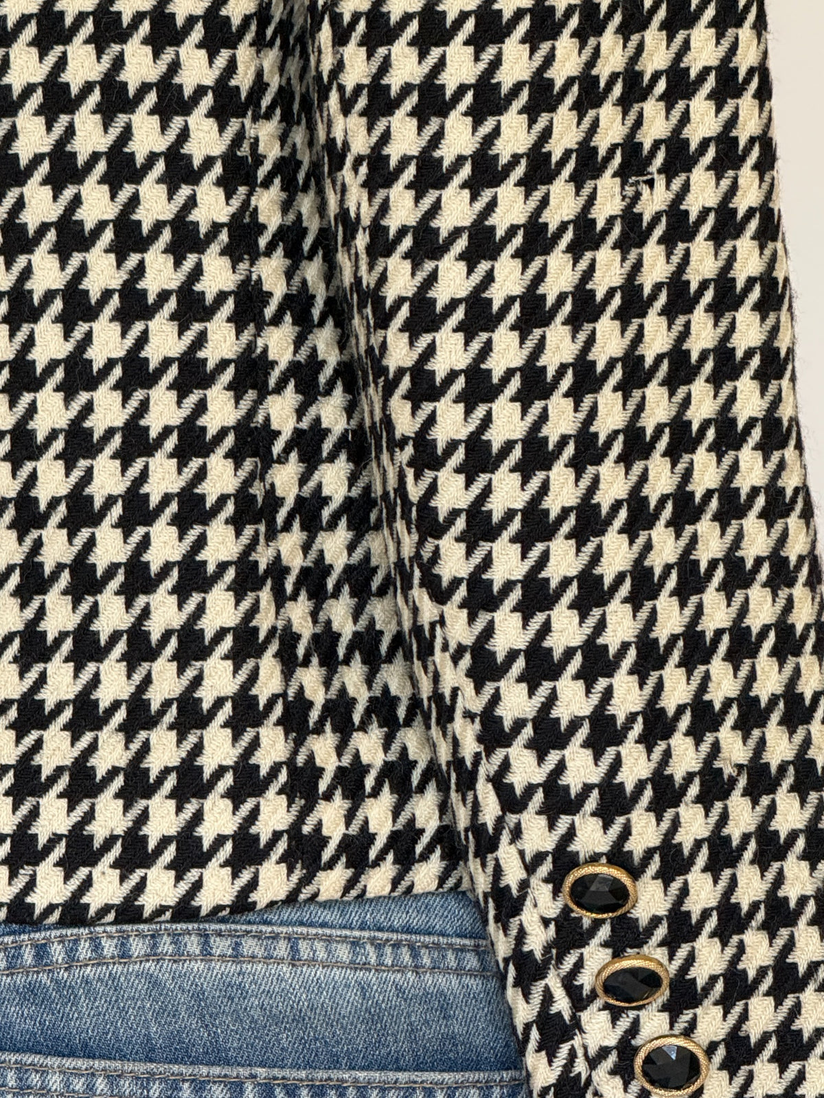 Vintage houndstooth wool blazer black and cream fabric close-up