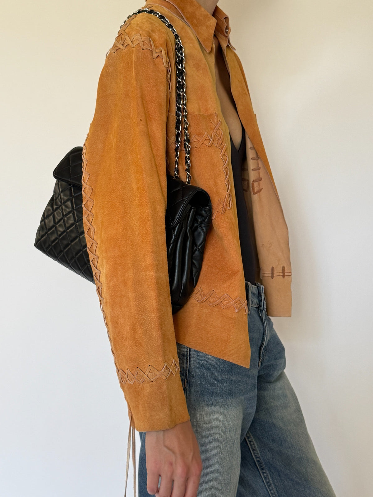 Vintage burnt orange suede leather jacket angled front view