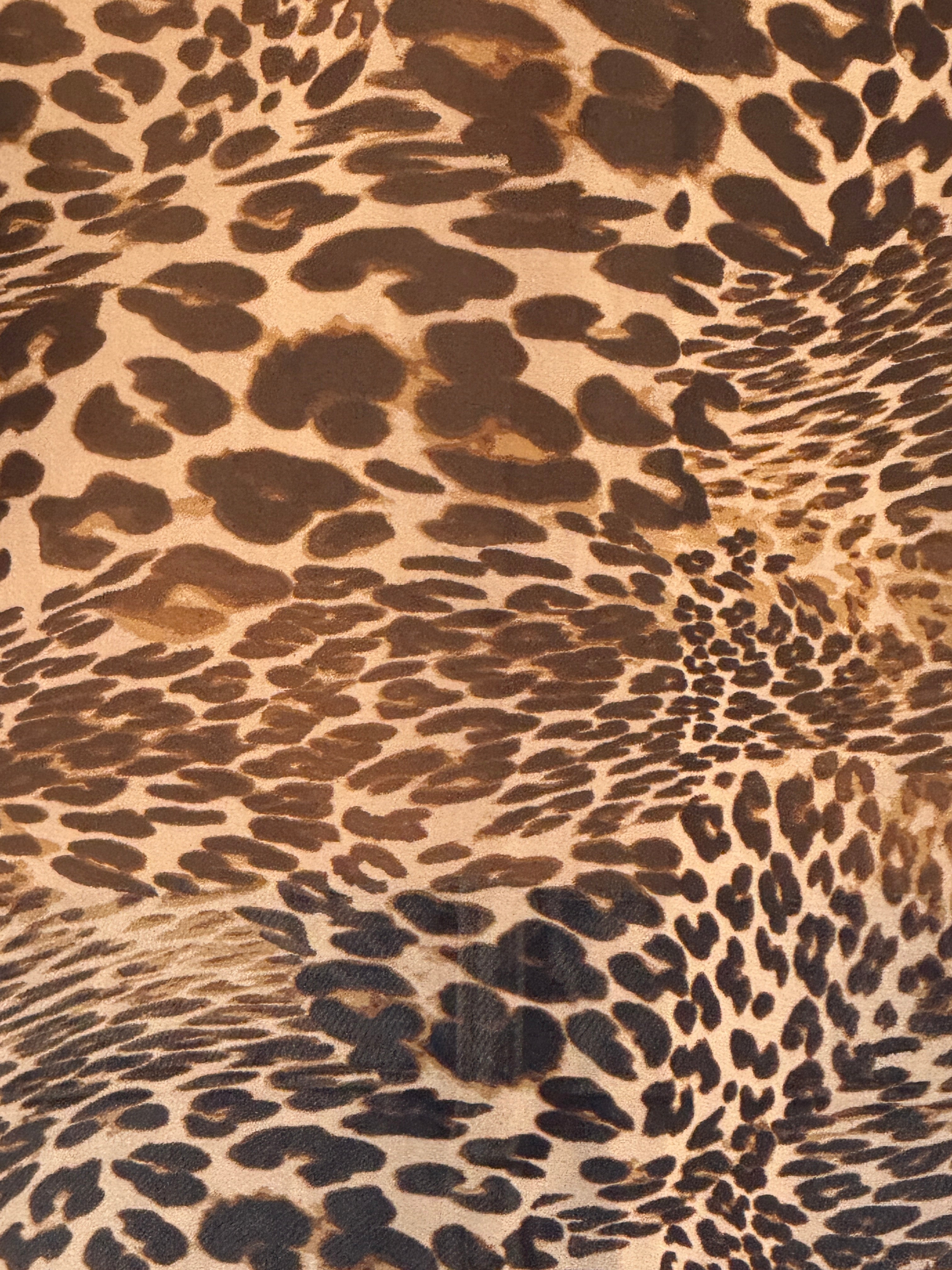 Vintage leopard print button-up shirt close-up