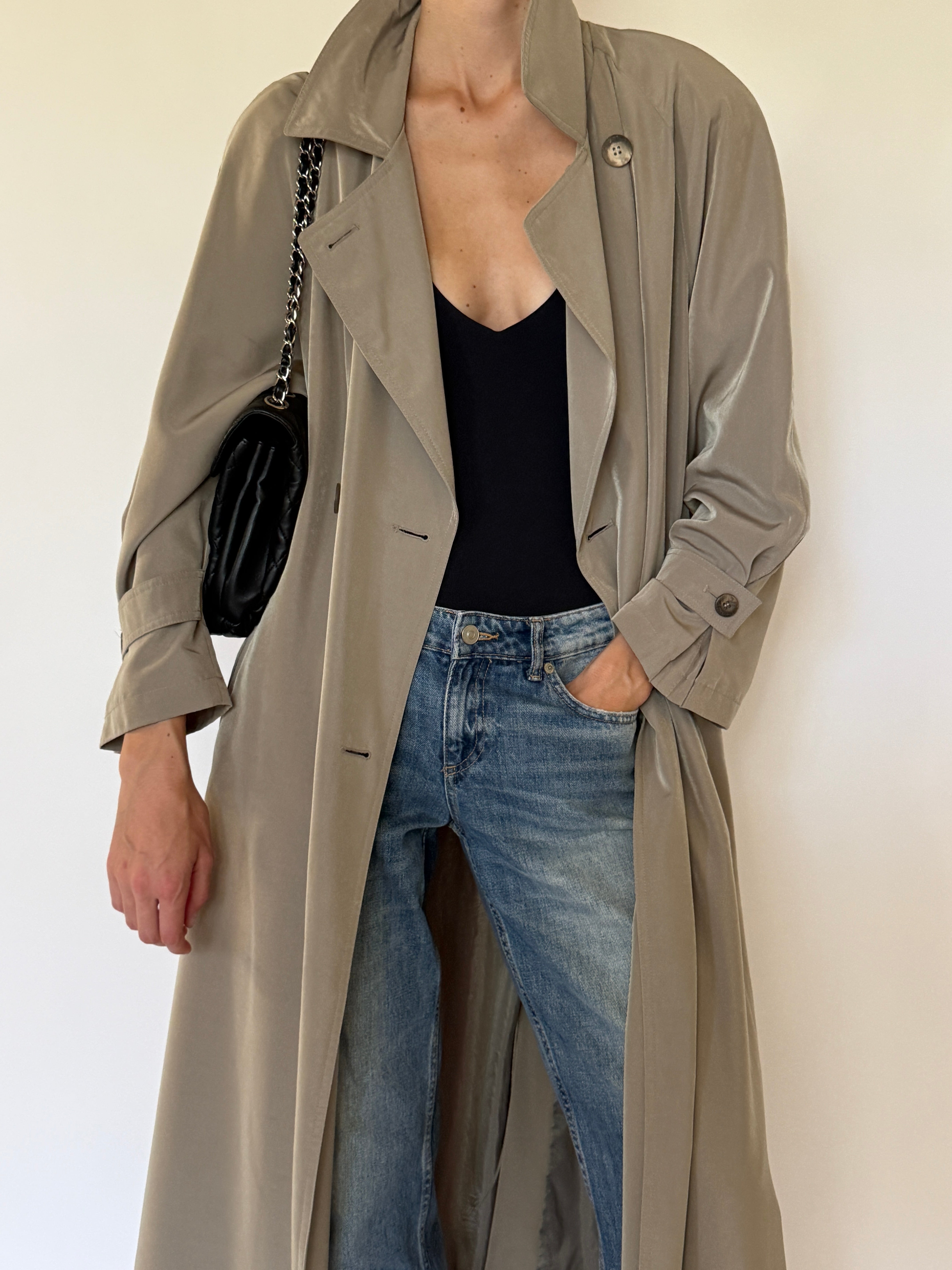 Vintage taupe trench coat fabric close-up