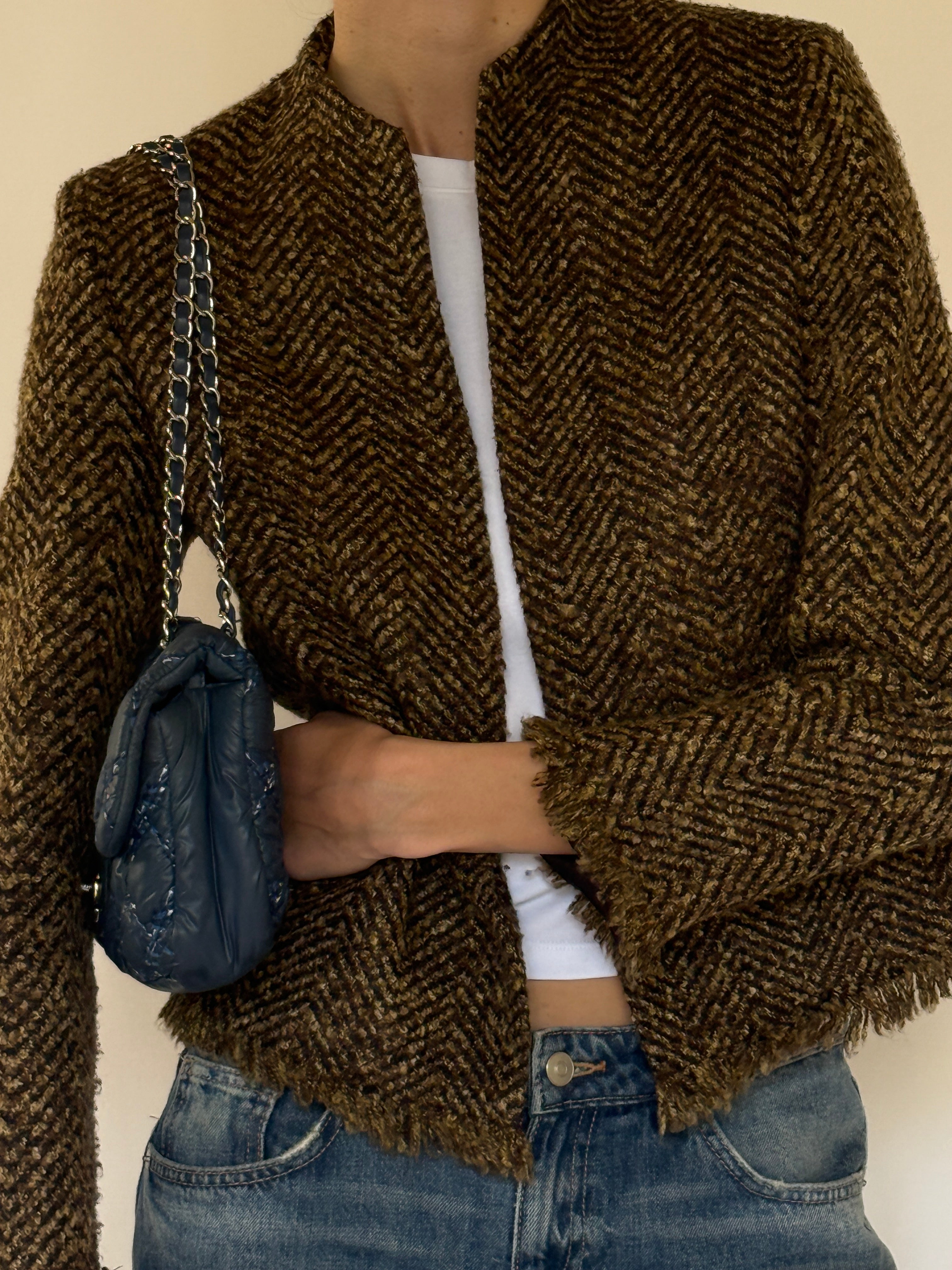 Vintage brown herringbone jacket close-up detail