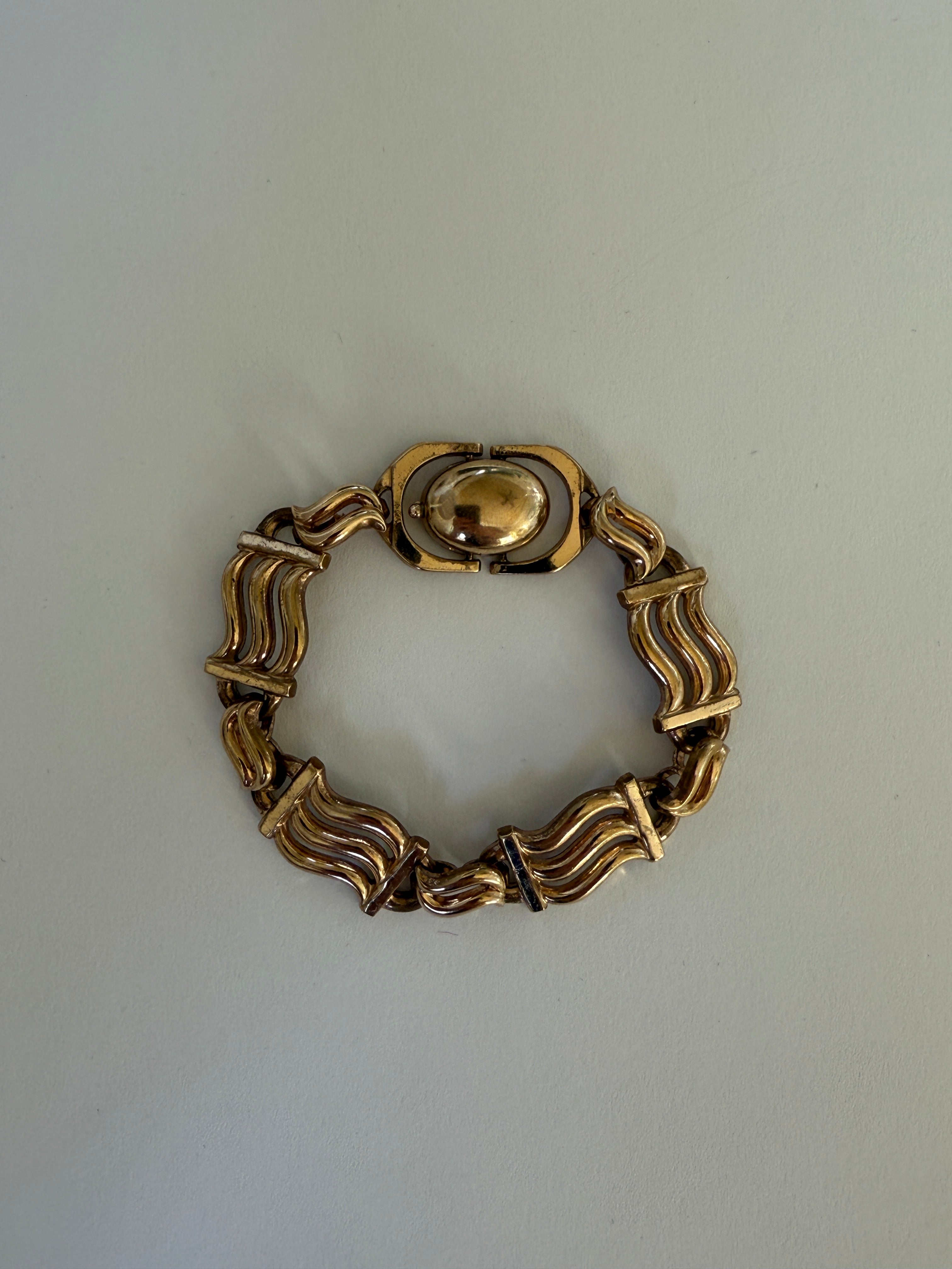 Vintage gold-tone bracelet full length laid flat