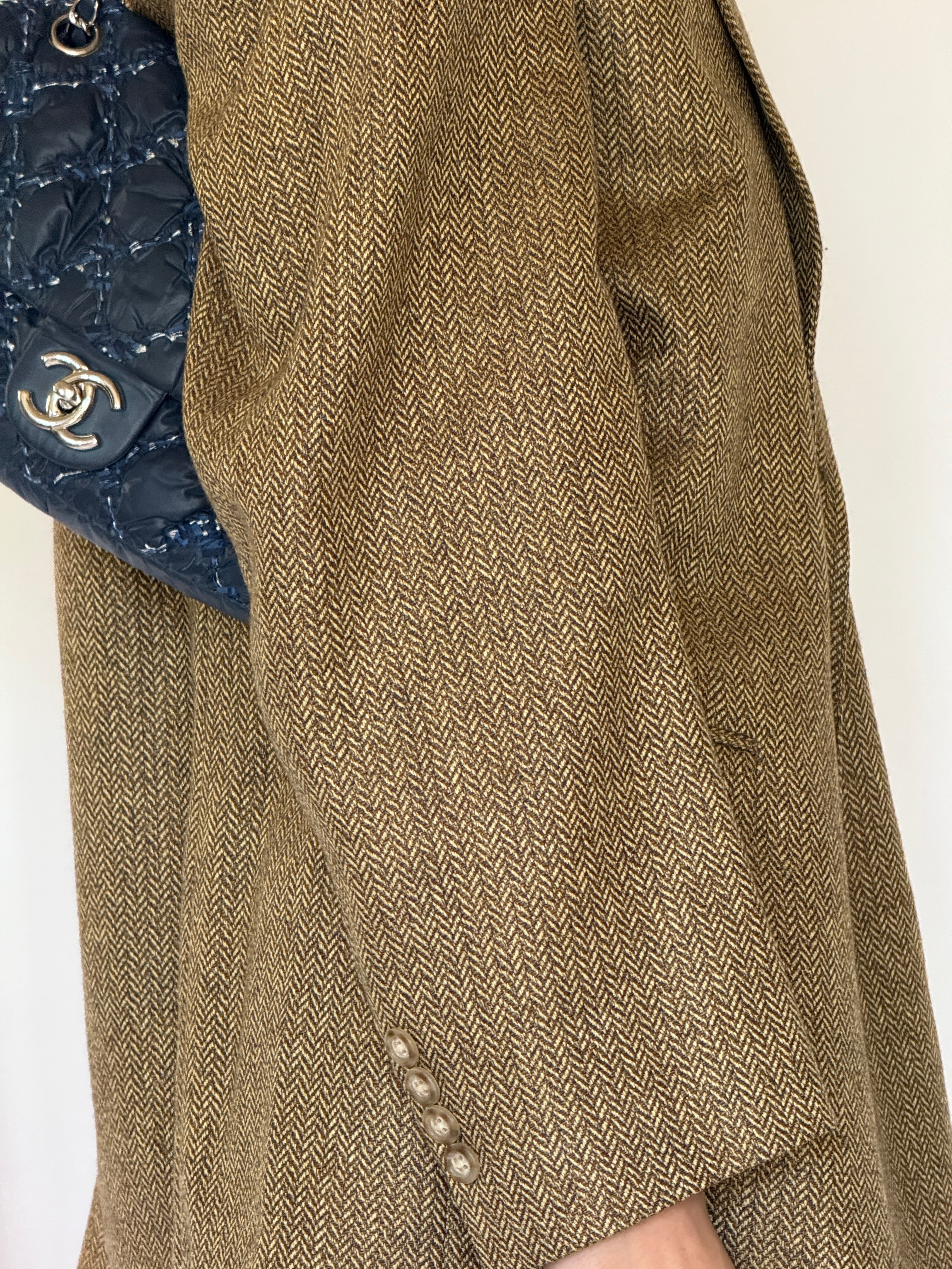 Vintage camel herringbone fabric close-up