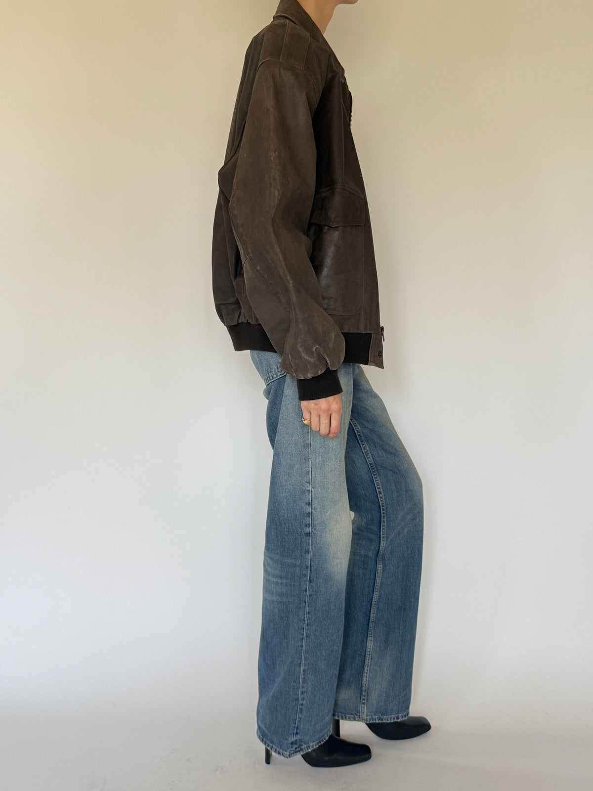 Vintage oversized leather bomber jacket side view brown