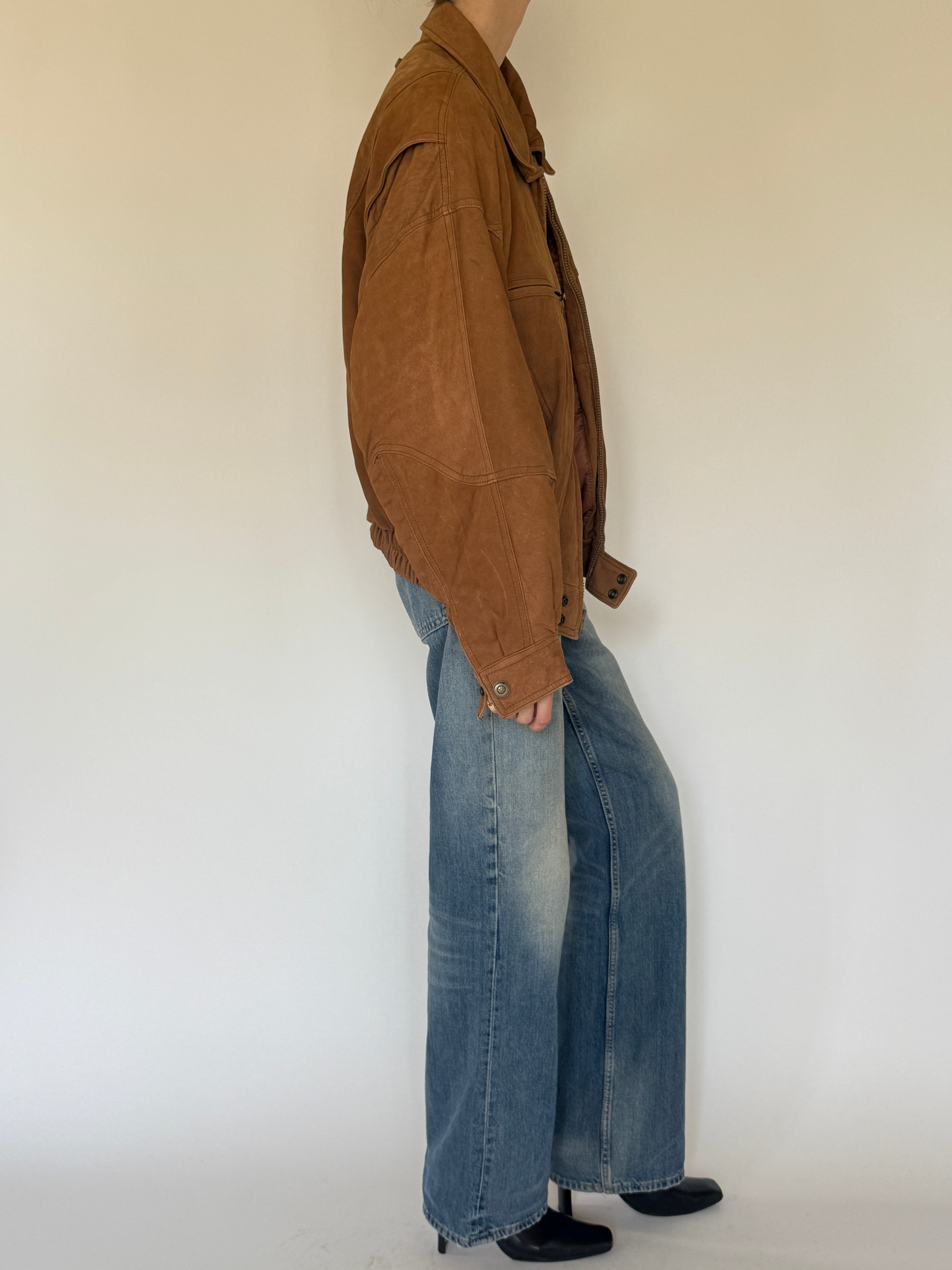 Vintage oversized cognac brown leather bomber jacket side view