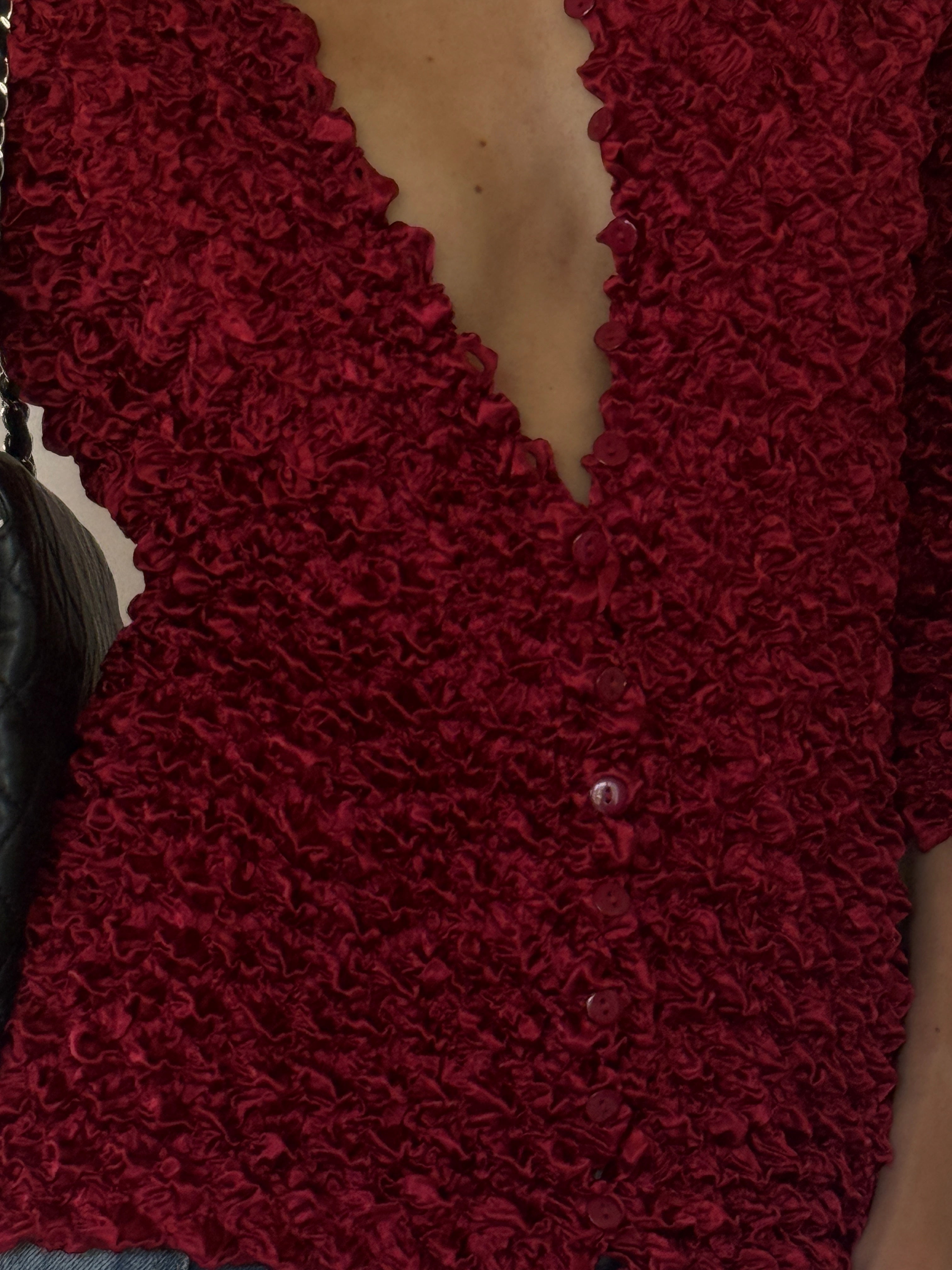 Vintage red ruched fabric close-up