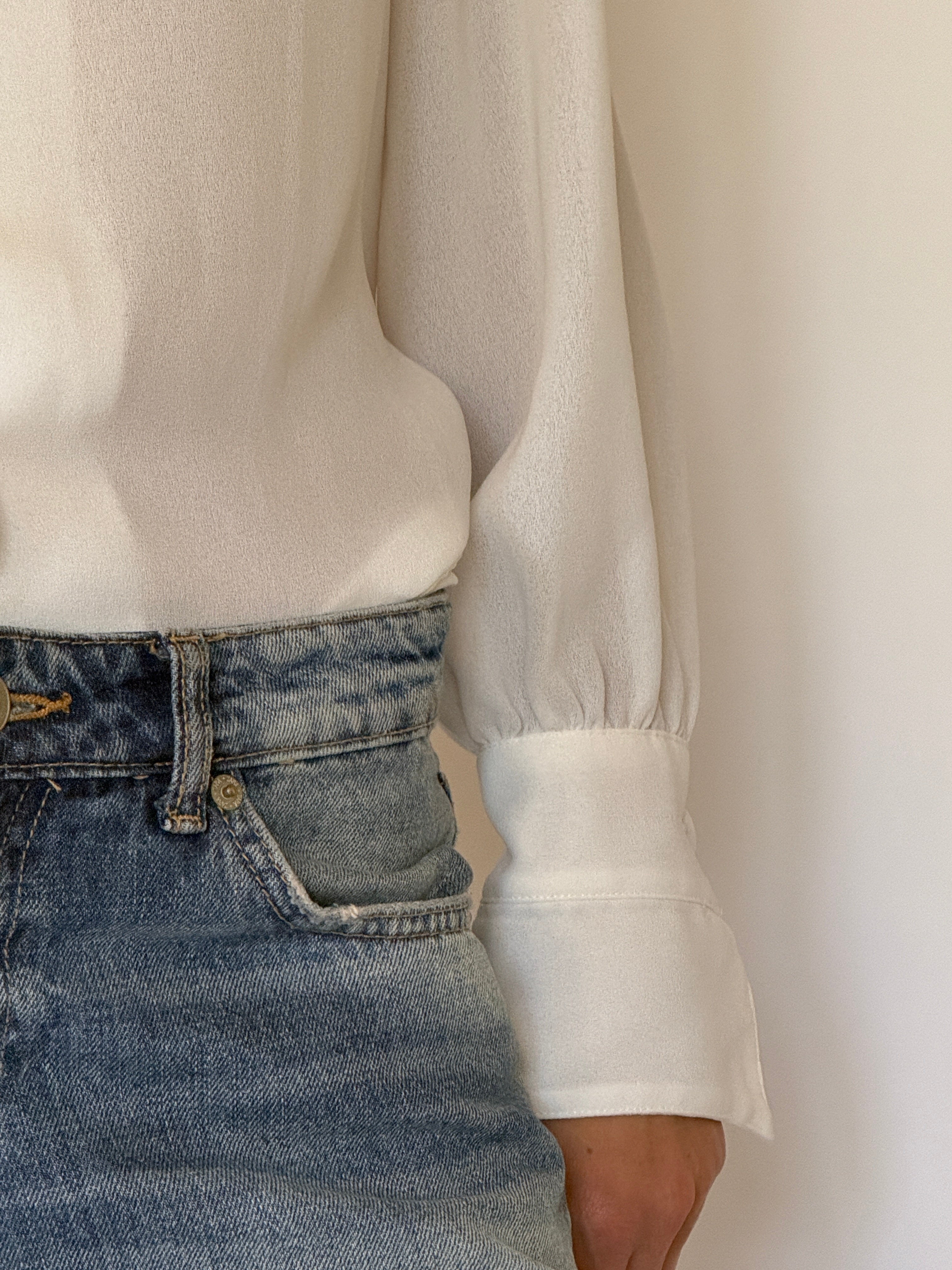 Vintage dramatic cuff detail on off-white blouse