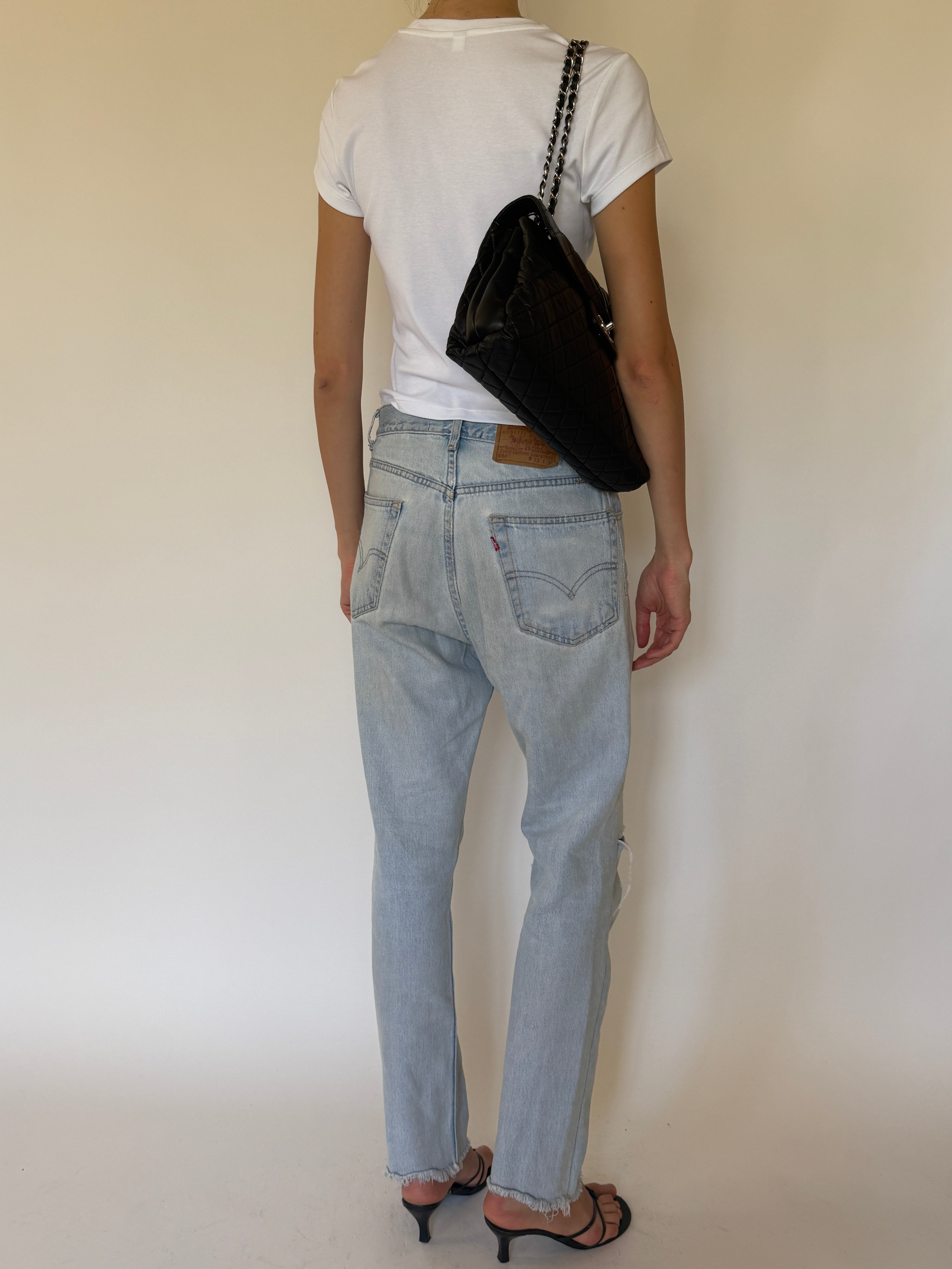 Vintage Levi's 550 light wash jeans back view