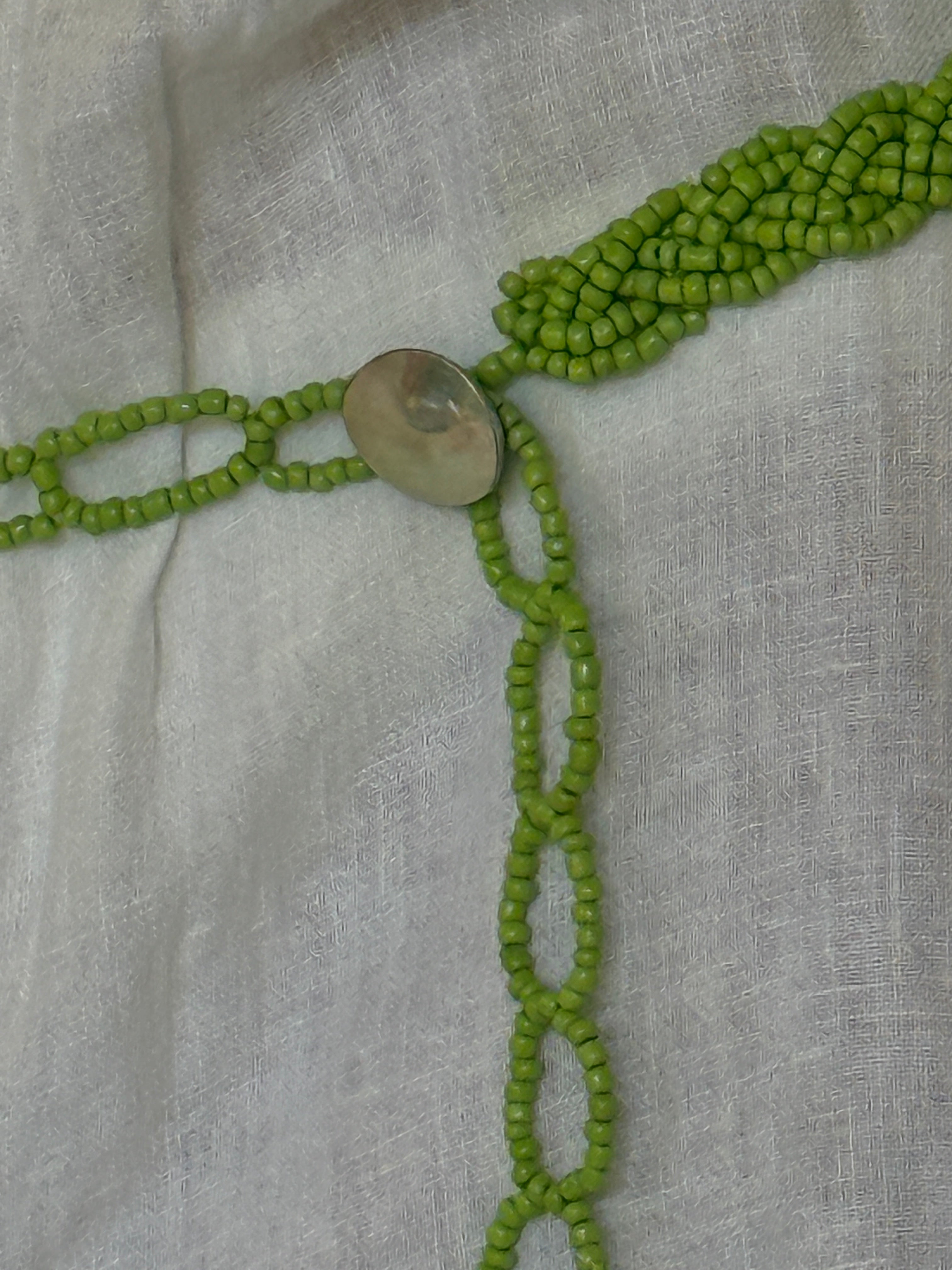 Vintage hand-beaded detail close-up
