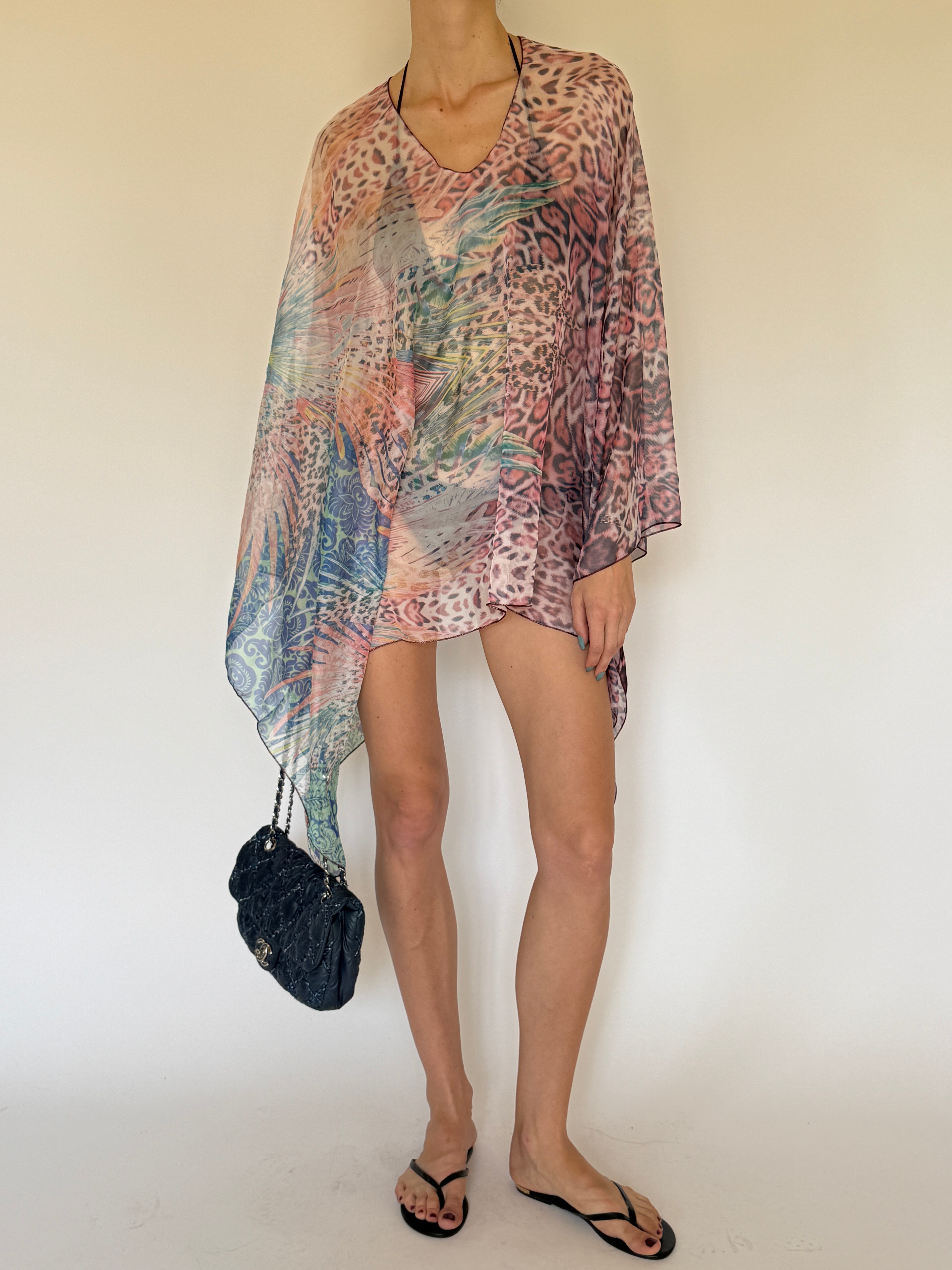 Vintage printed asymmetric swim cover-up worn over swimwear