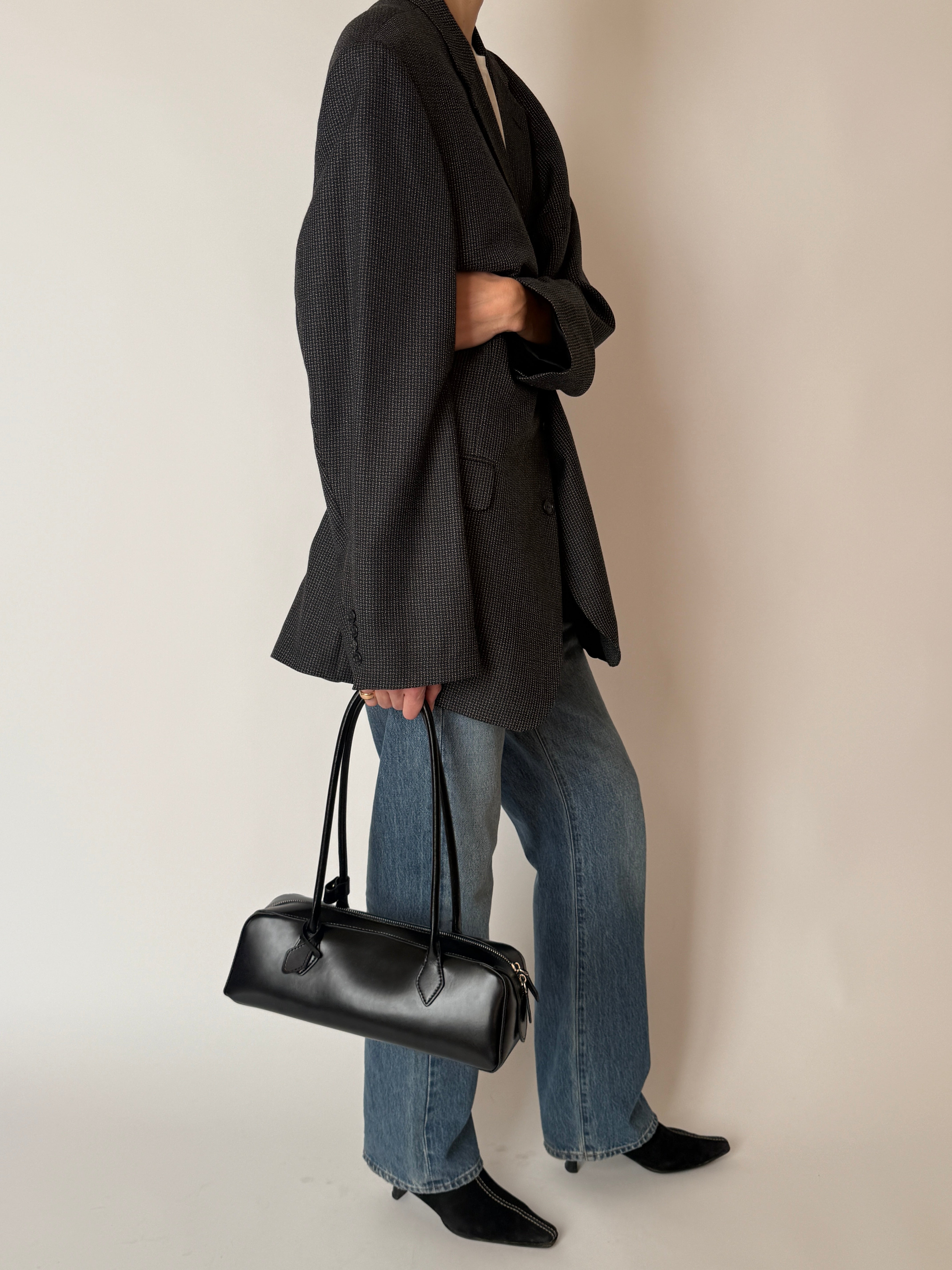 Vintage wool blend blazer showing side full body view in charcoal