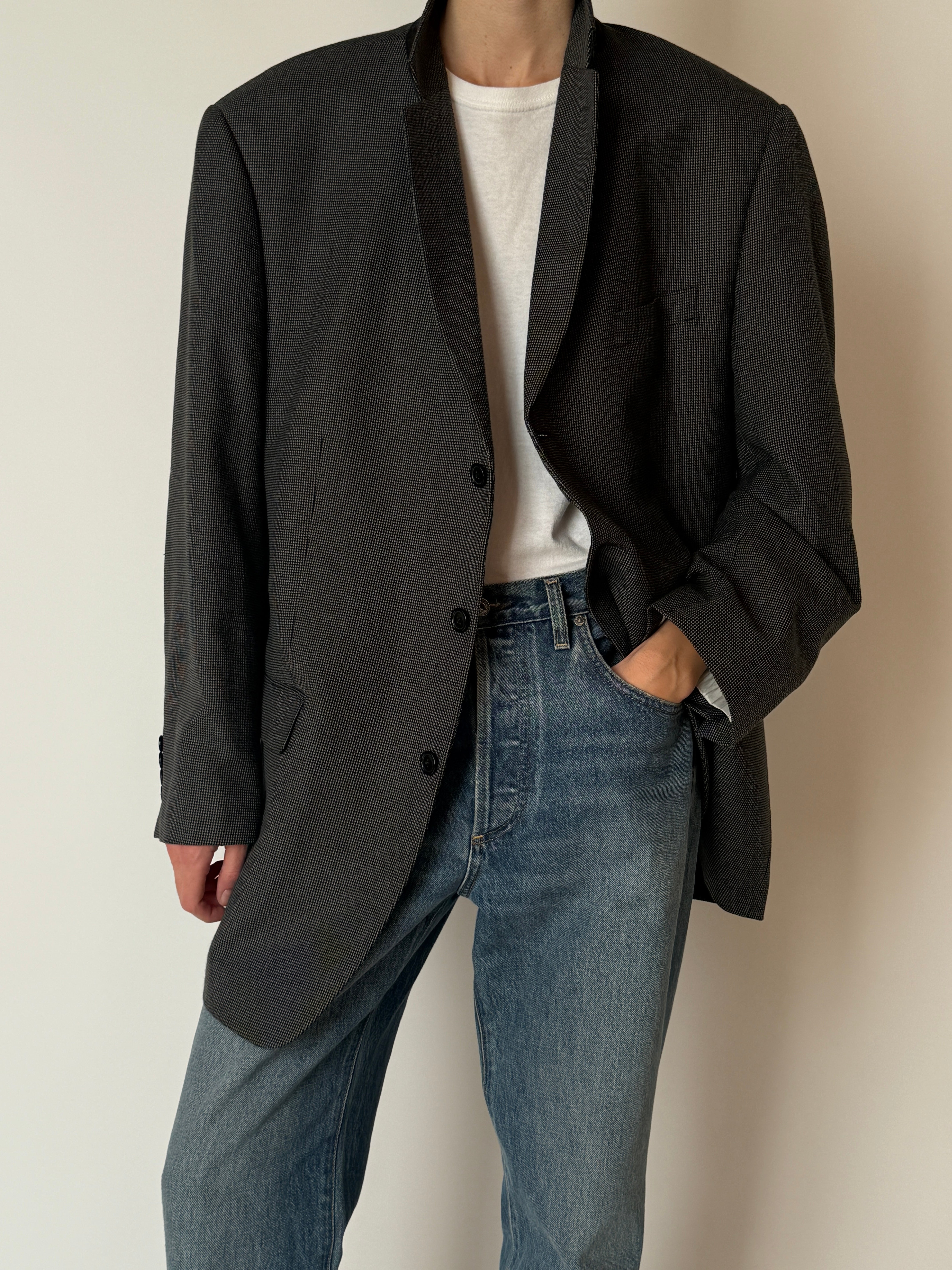 Vintage textured black and cream blazer close-up detail