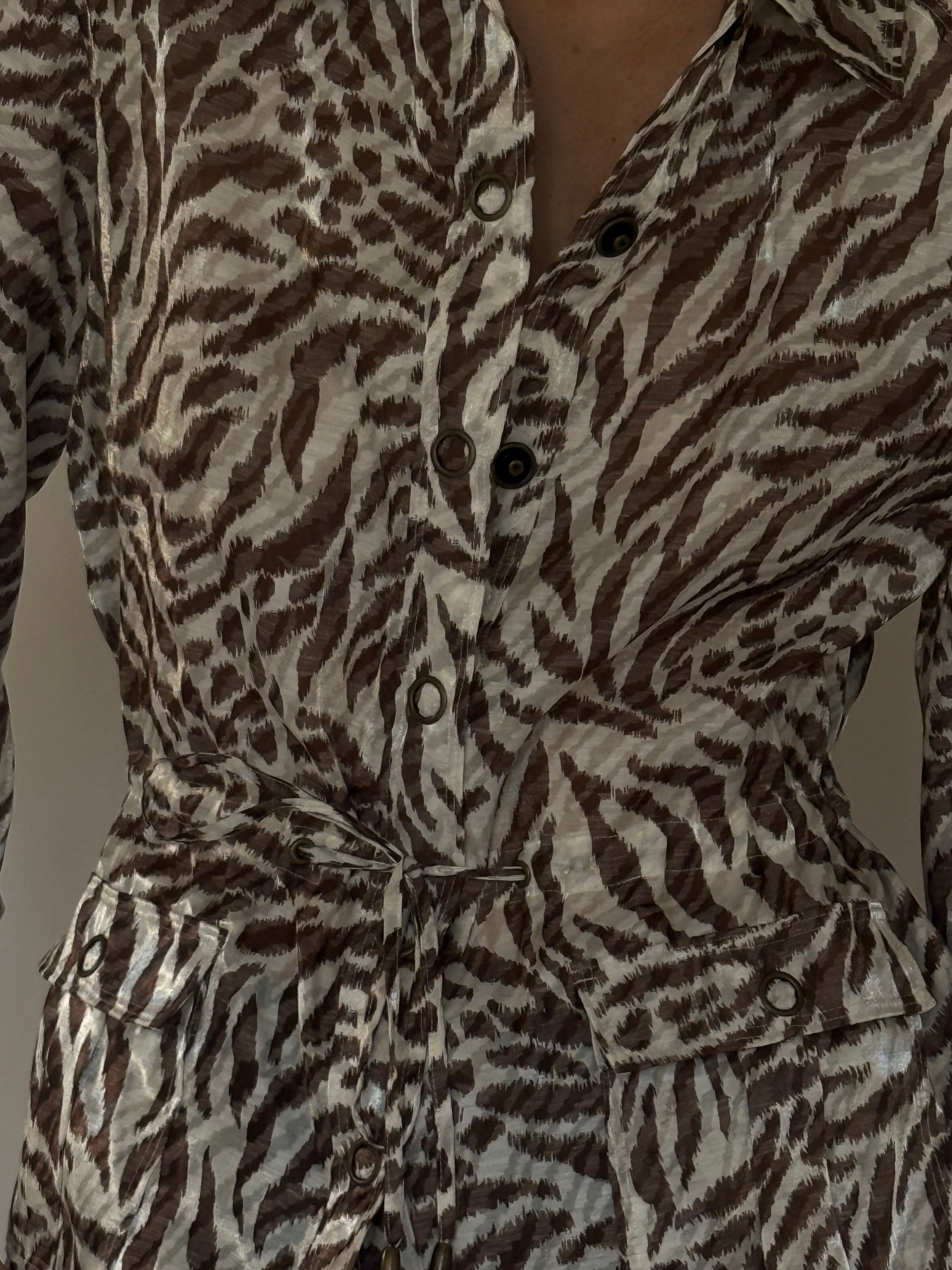 Vintage animal print belted blouse fabric close-up