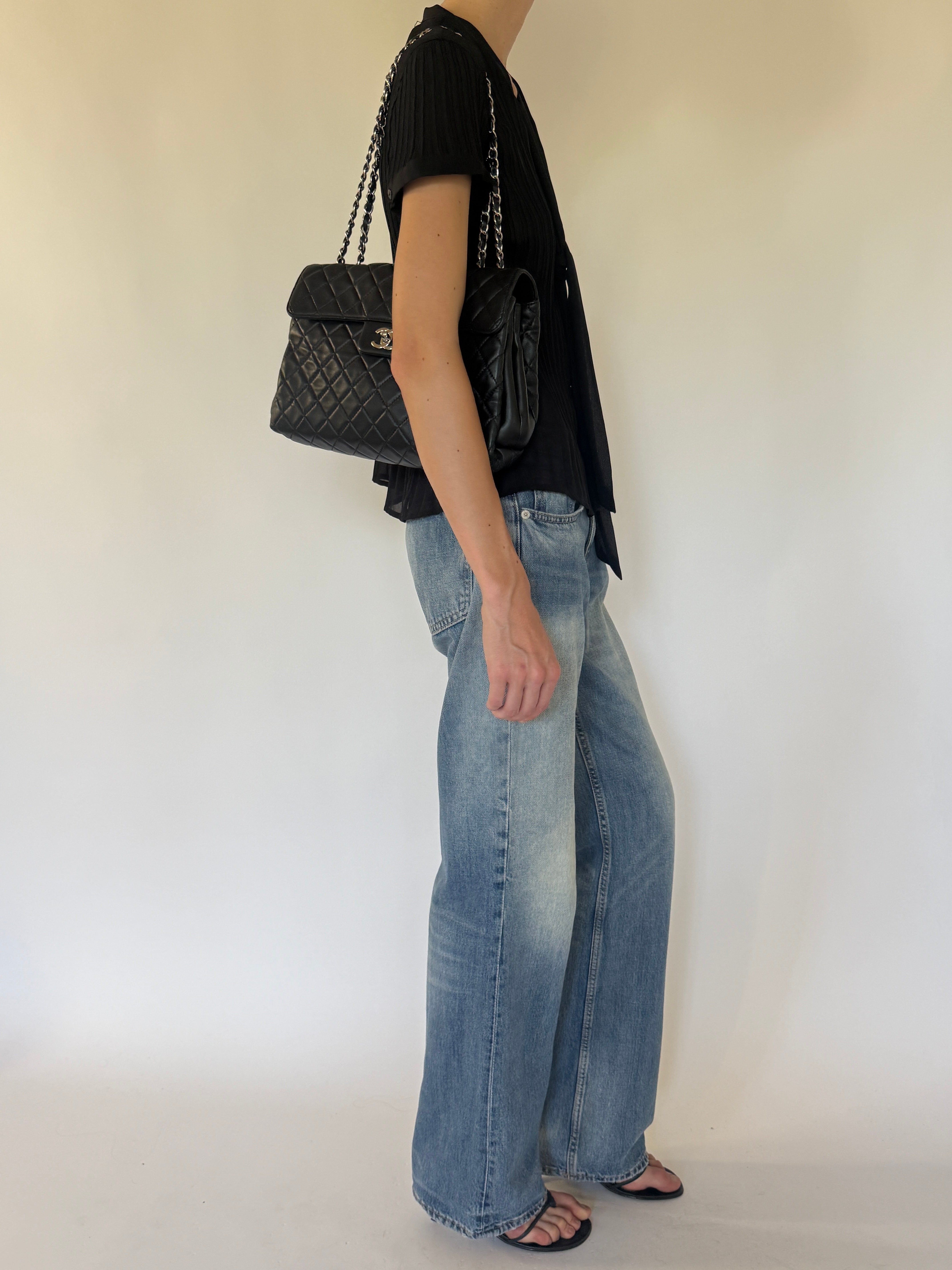 Vintage black pleated blouse side view