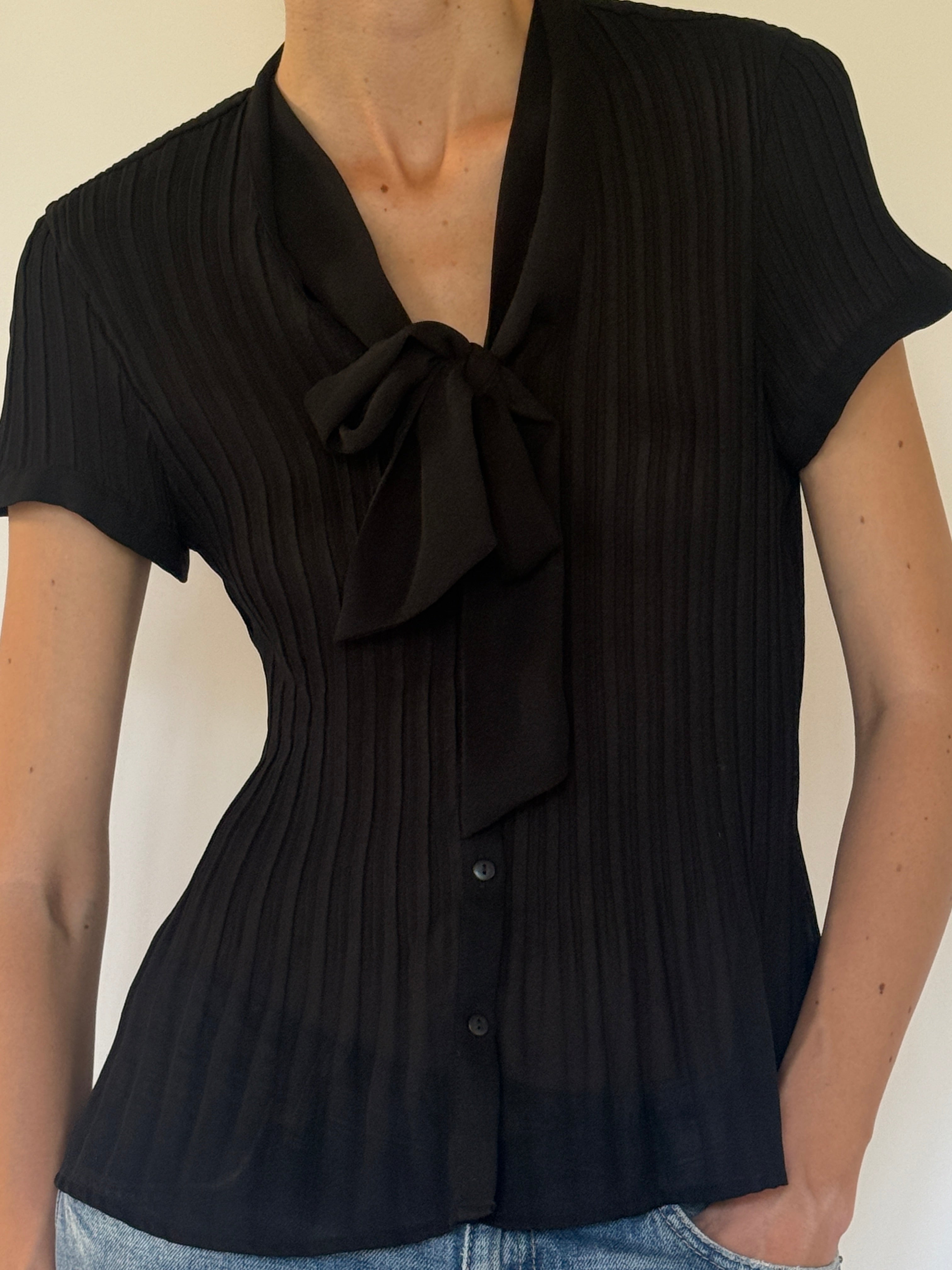 Vintage black pleated tie-neck blouse front view