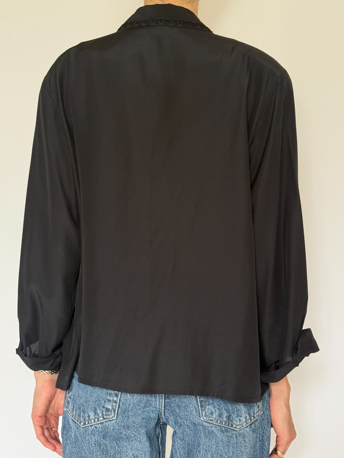 Back view black vintage blouse