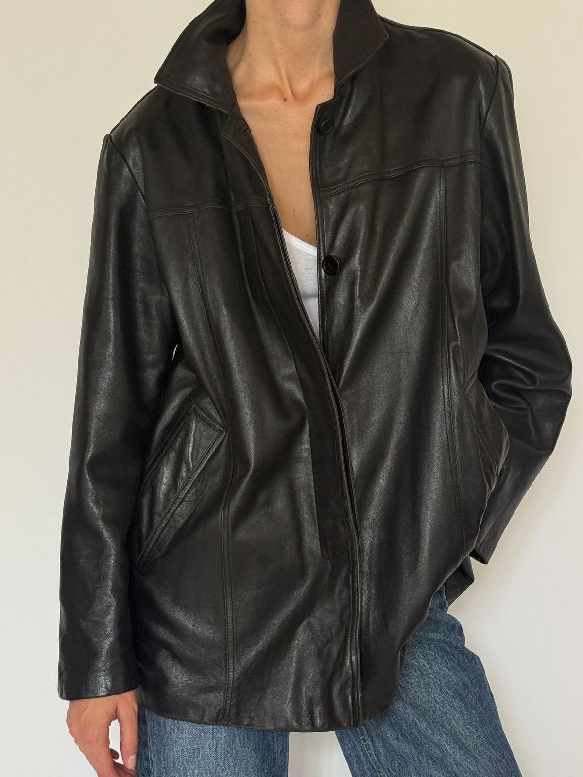 Vintage black leather jacket front view