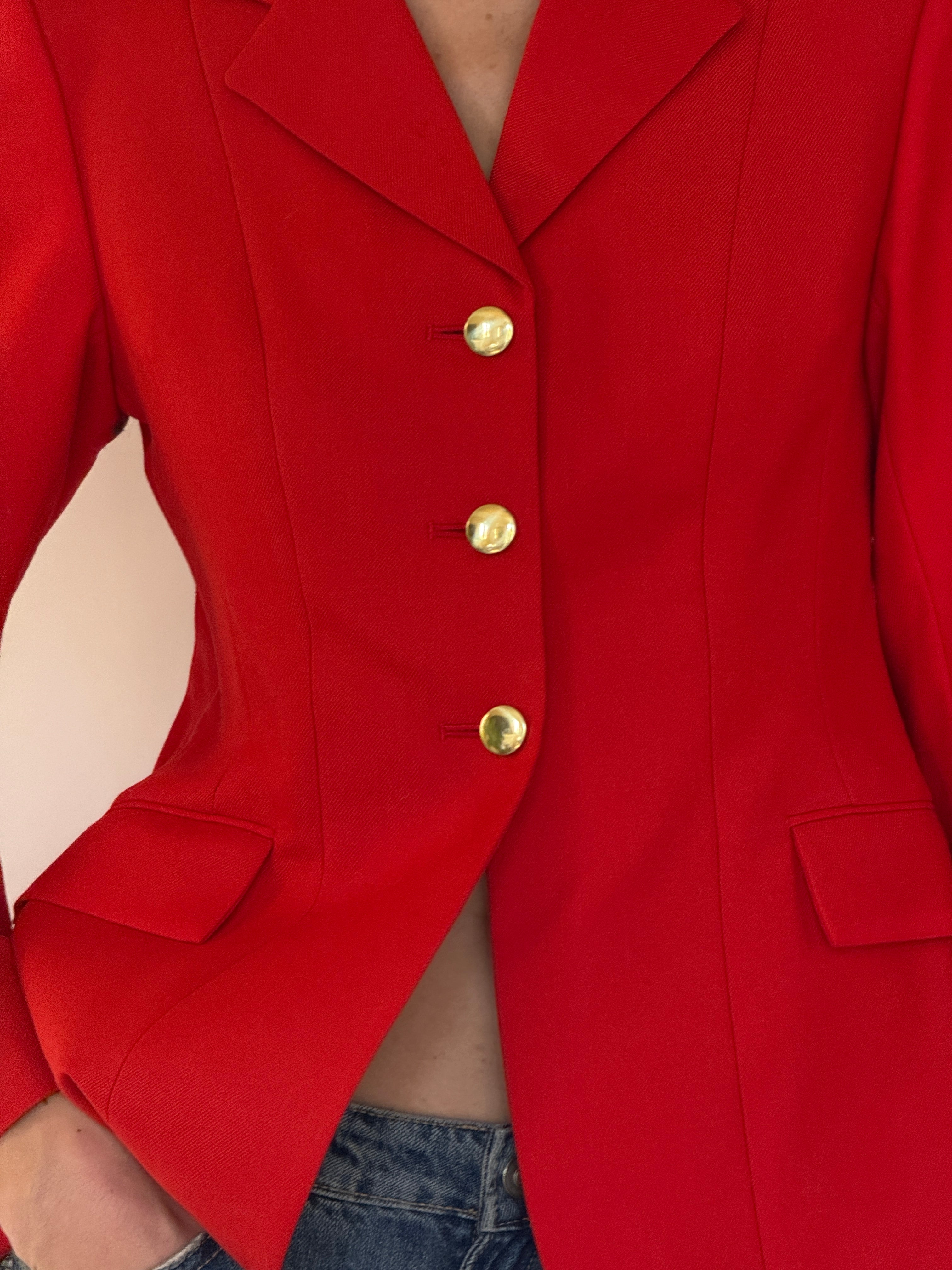 Vintage red wool blazer fabric close-up