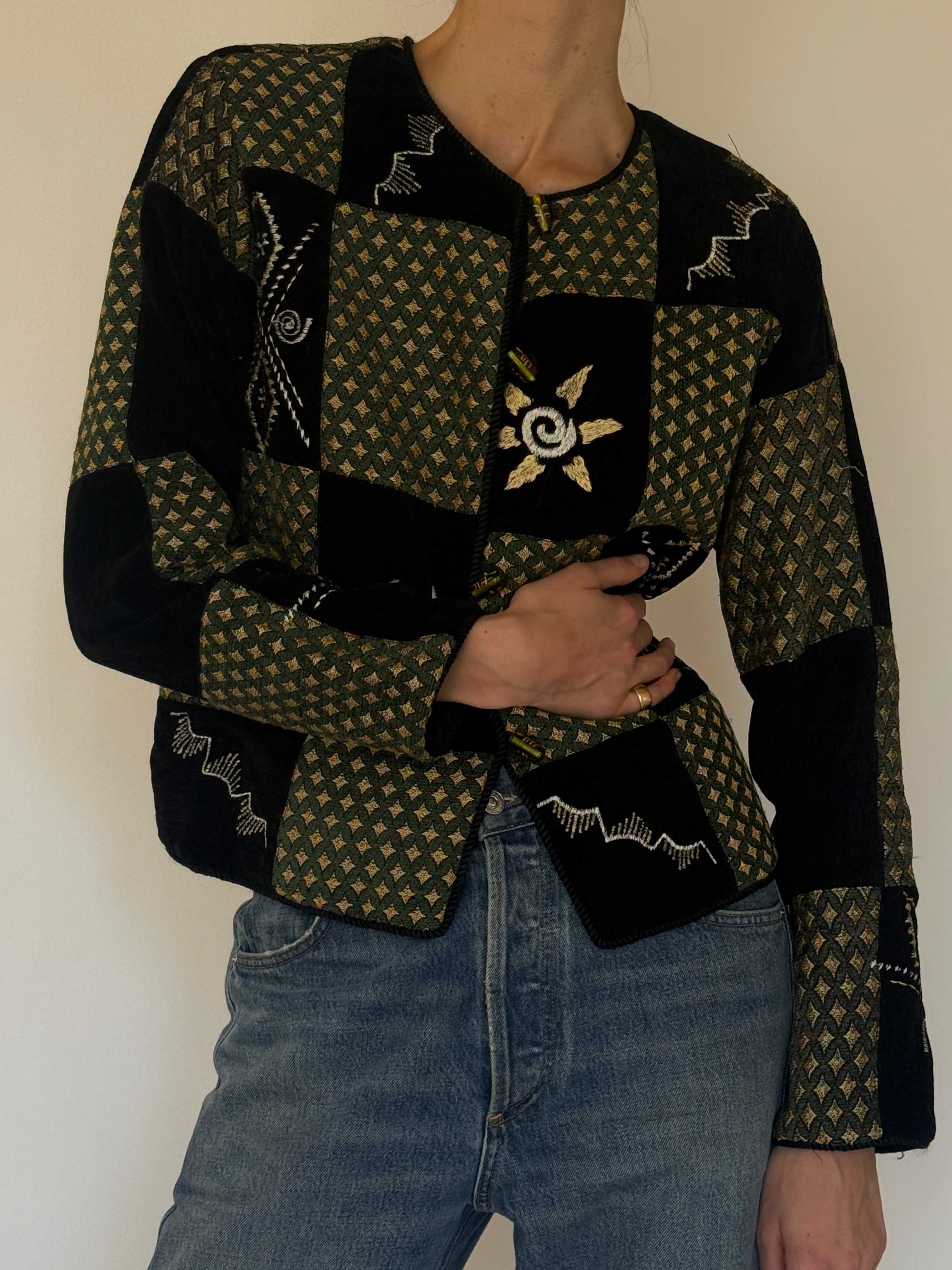 Vintage green patchwork jacket embroidered motif detail