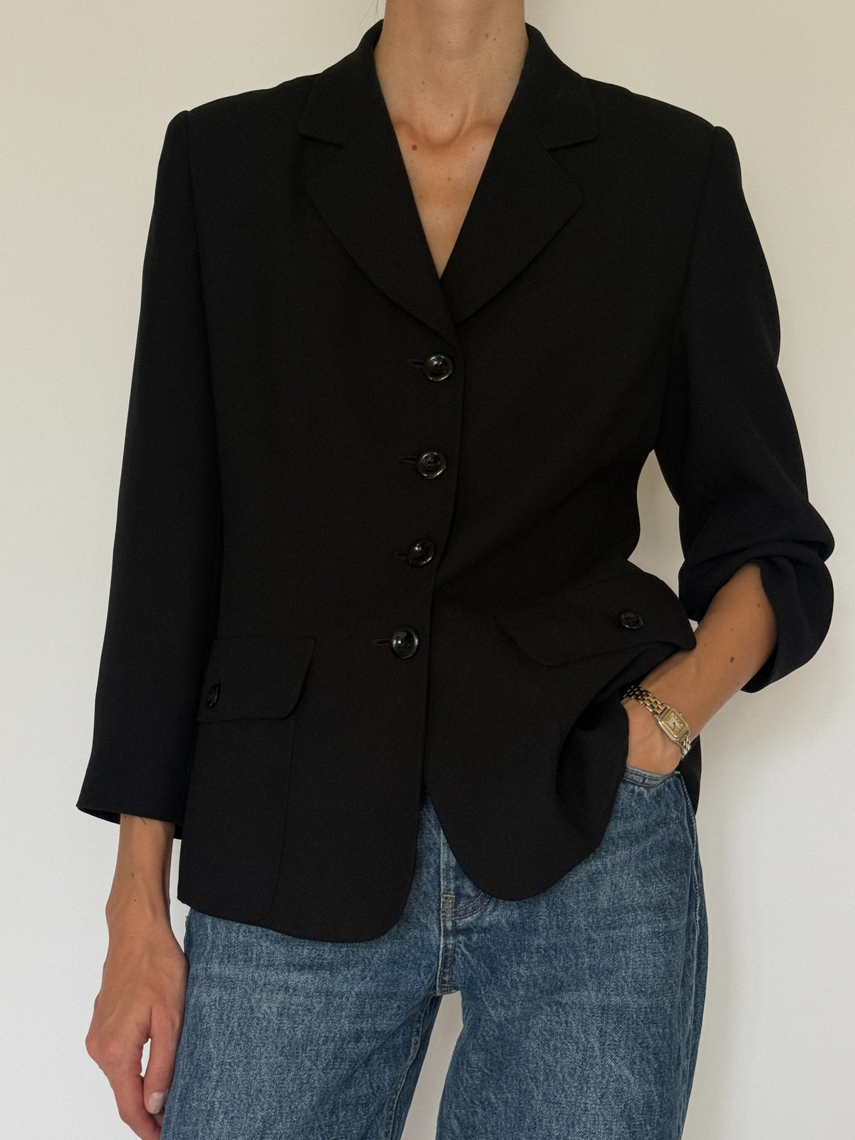 Vintage black tailored blazer button and pocket detail