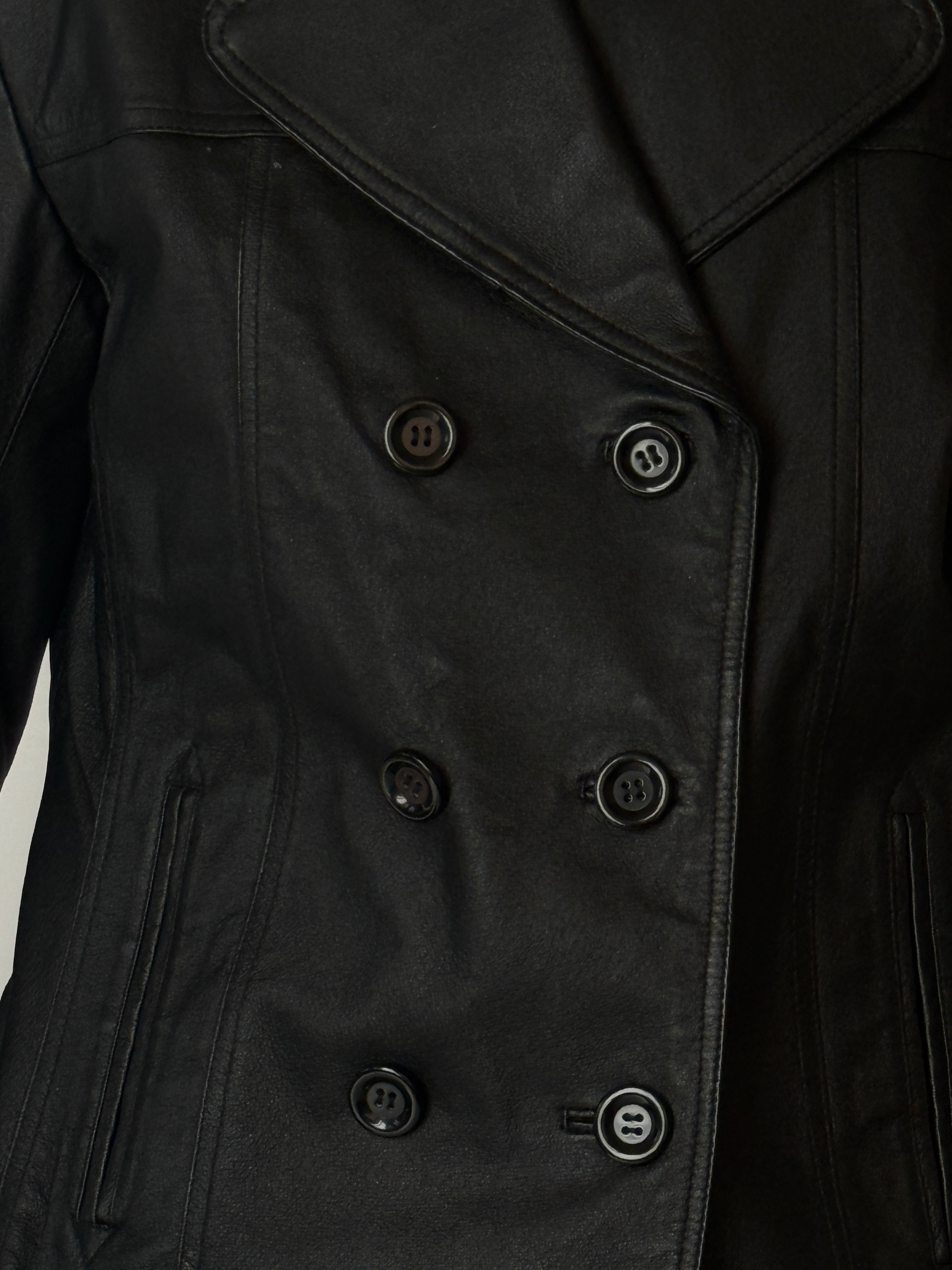 Vintage leather jacket with notched lapels and button-front closure in black