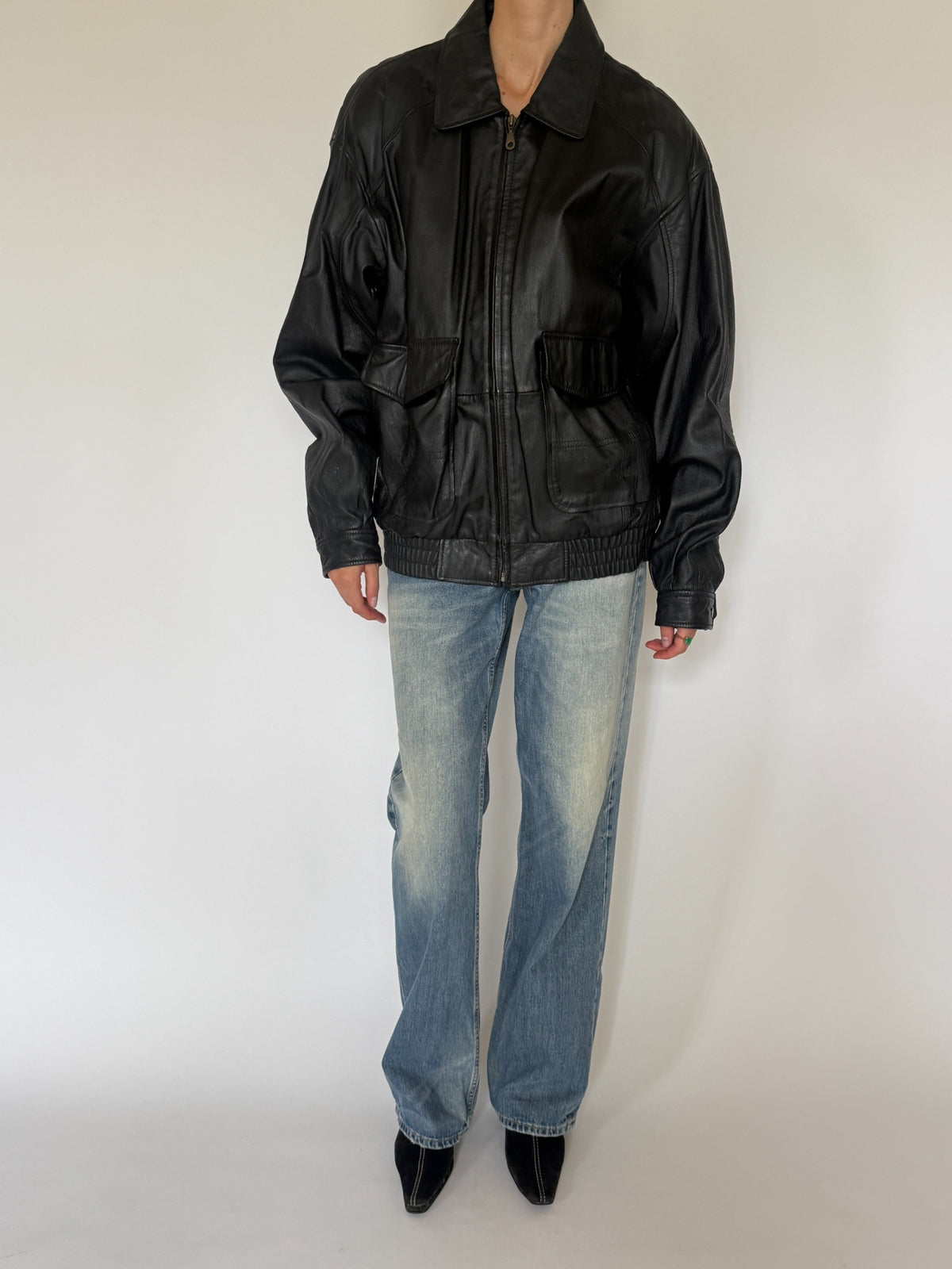 Vintage oversized leather bomber jacket black front view
