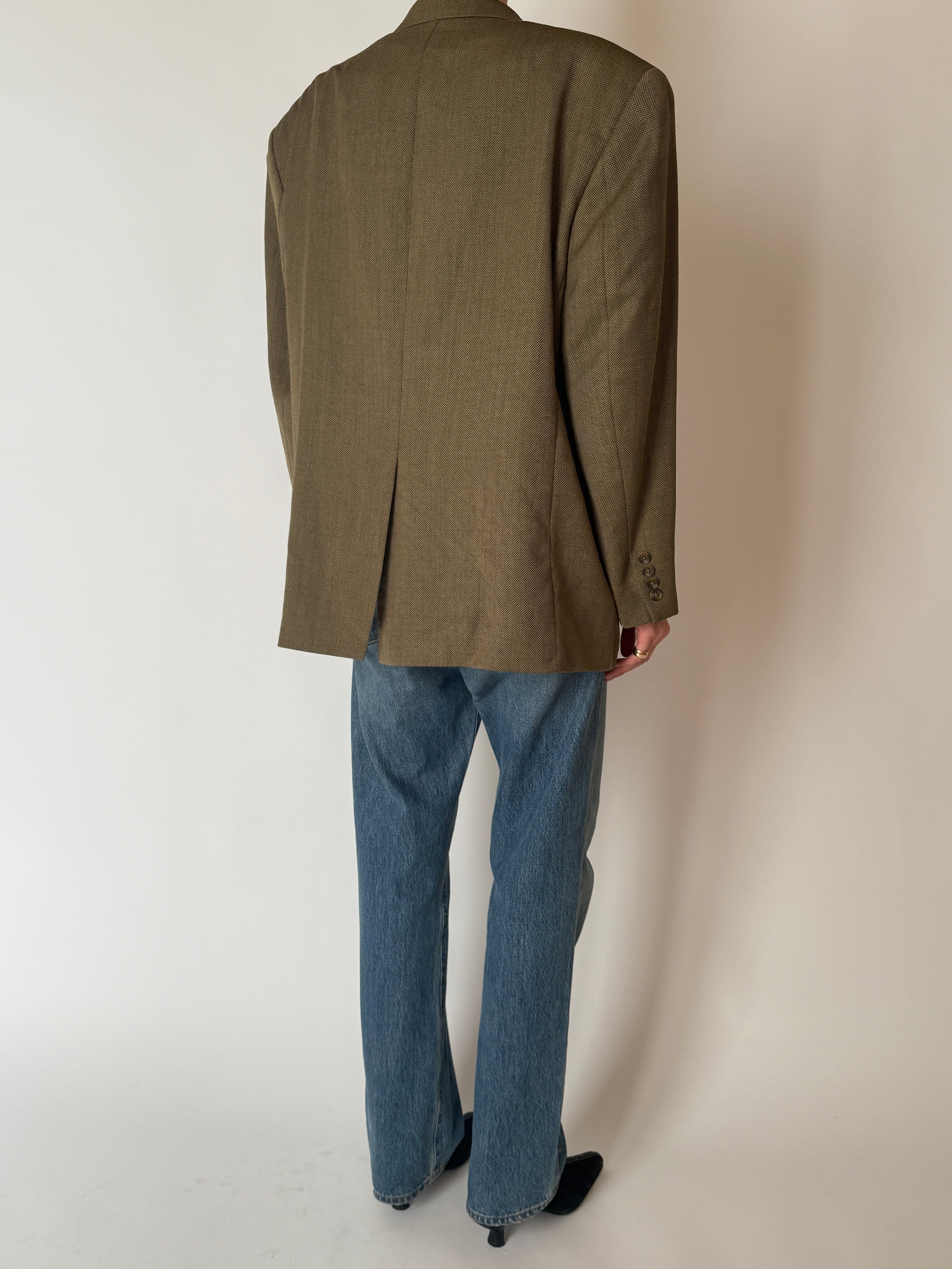 Side view of olive brown vintage blazer