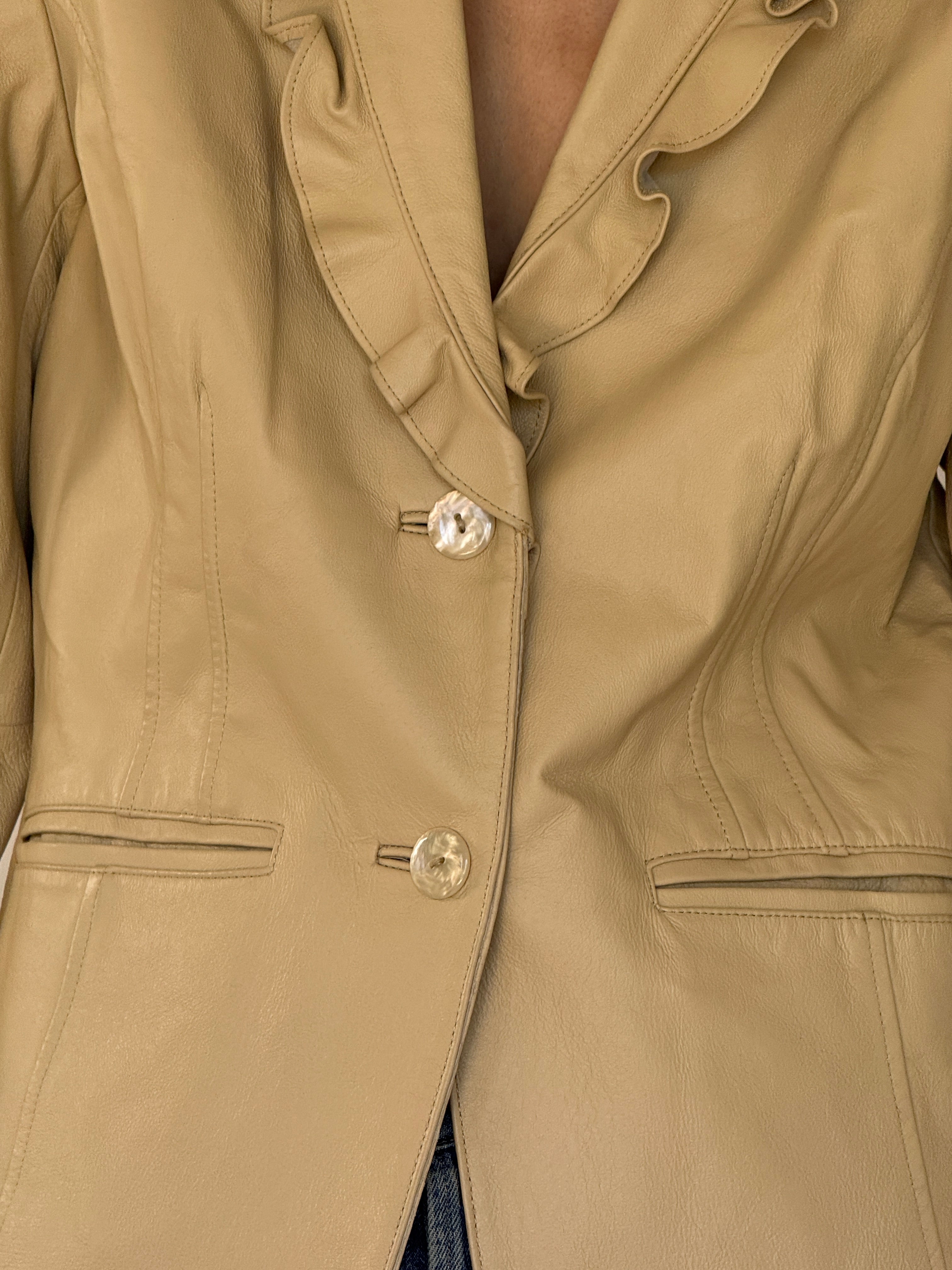 Vintage beige leather jacket button detail