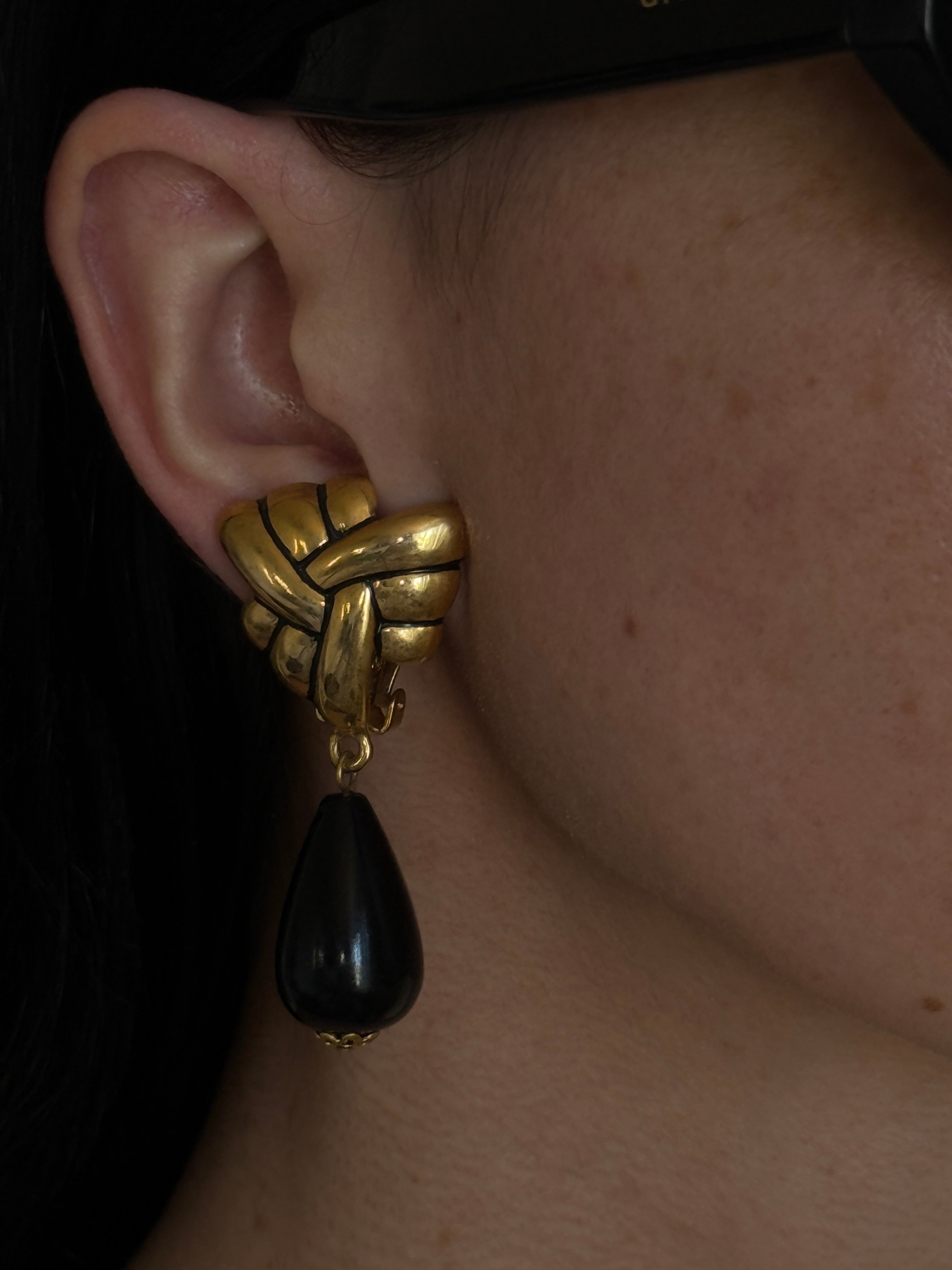 Vintage black teardrop pendant close-up