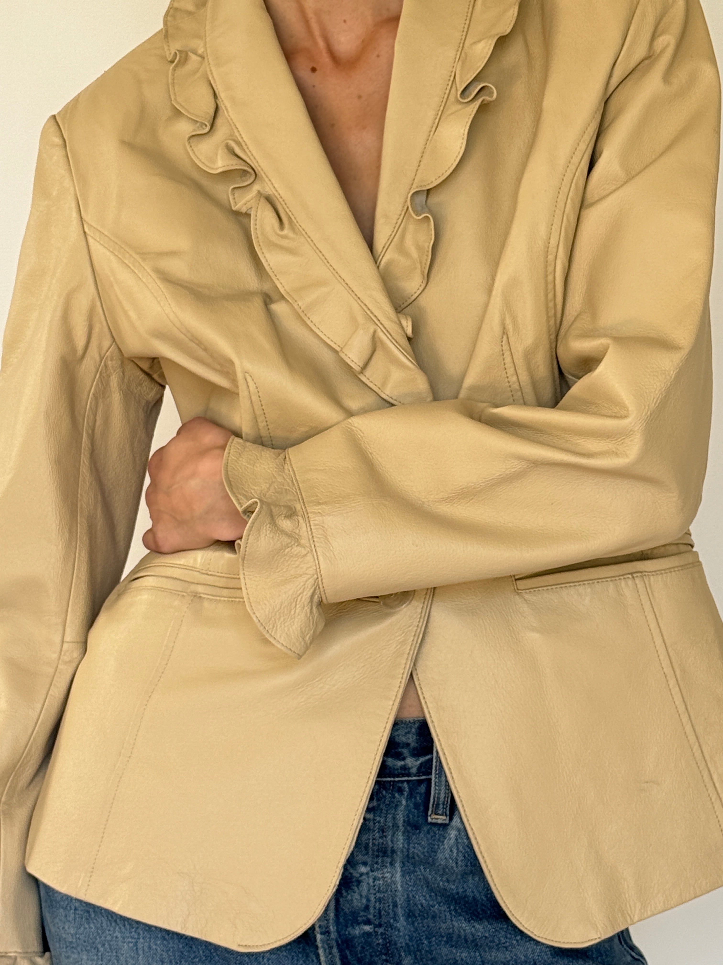 Vintage beige leather jacket button detail
