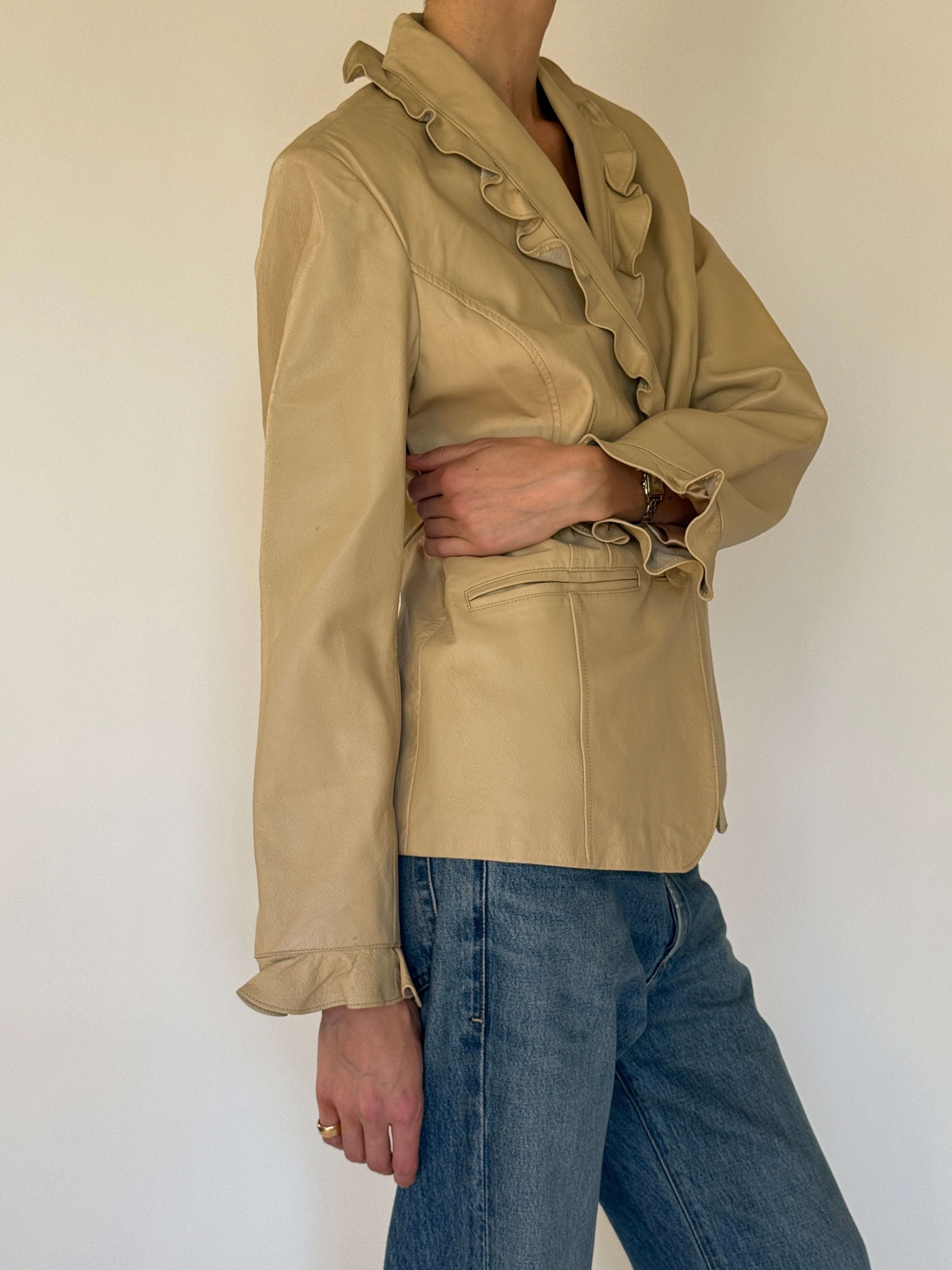 Vintage beige leather ruffle trim jacket side view