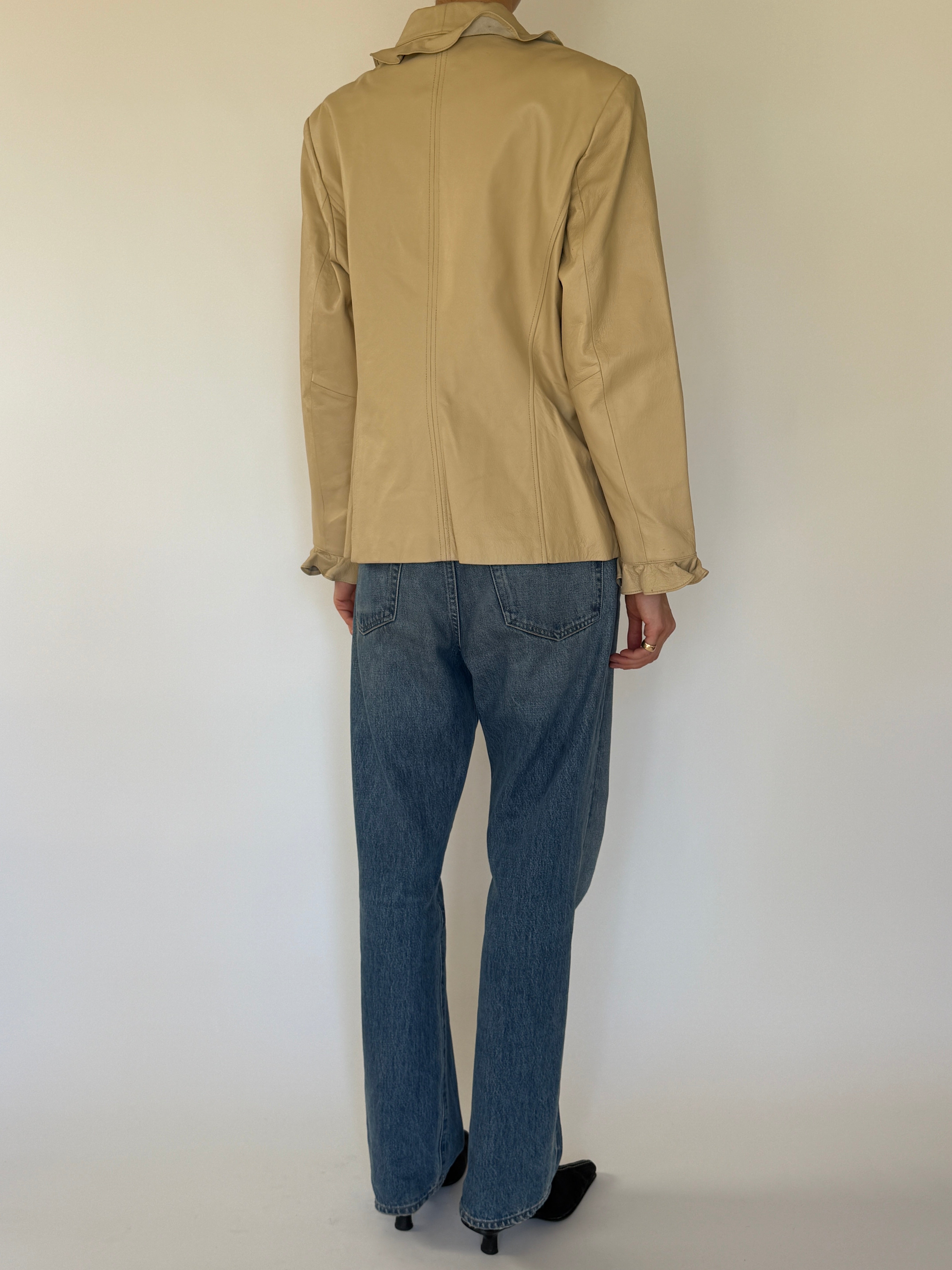 Vintage beige leather ruffle trim jacket back view