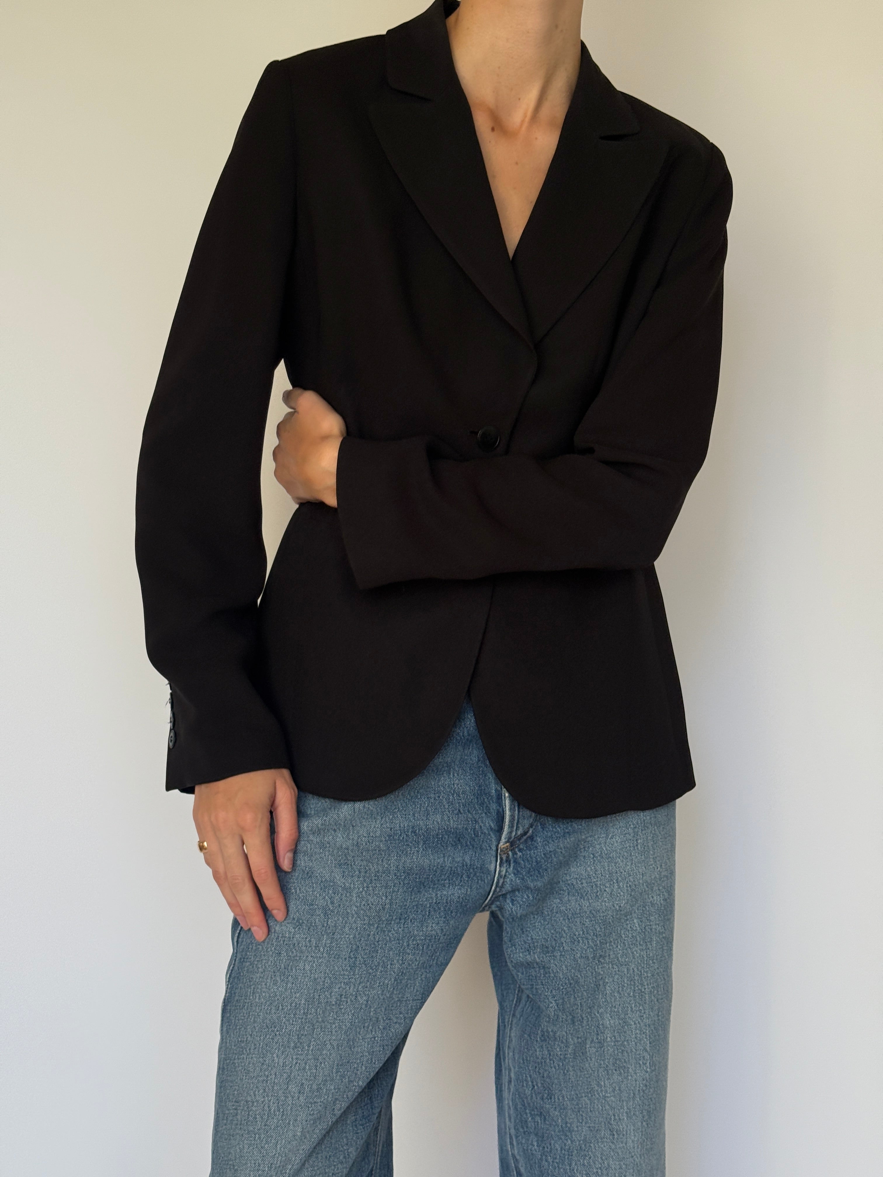 Vintage black tailored blazer styled with denim