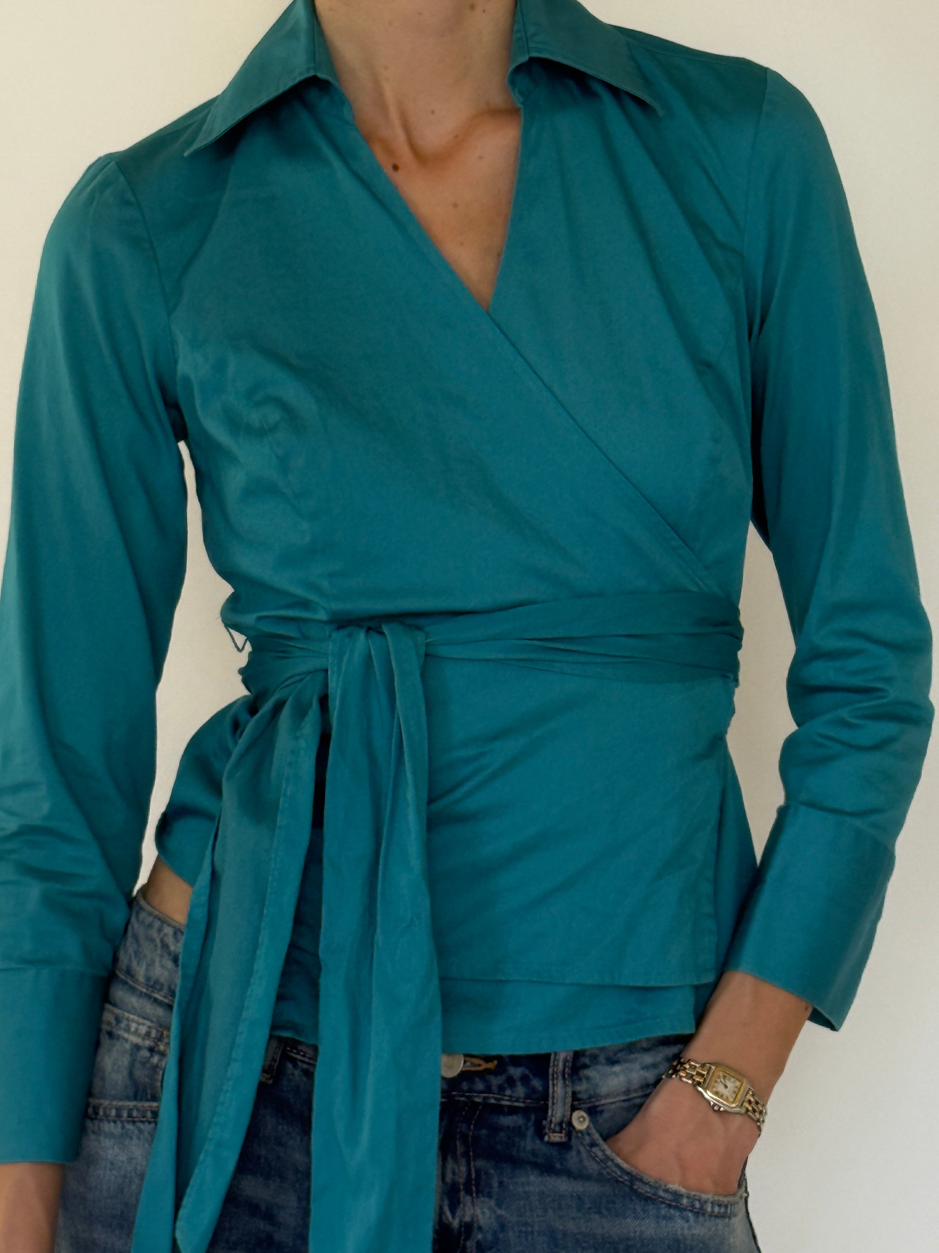 Vintage turquoise blouse close-up fabric detail