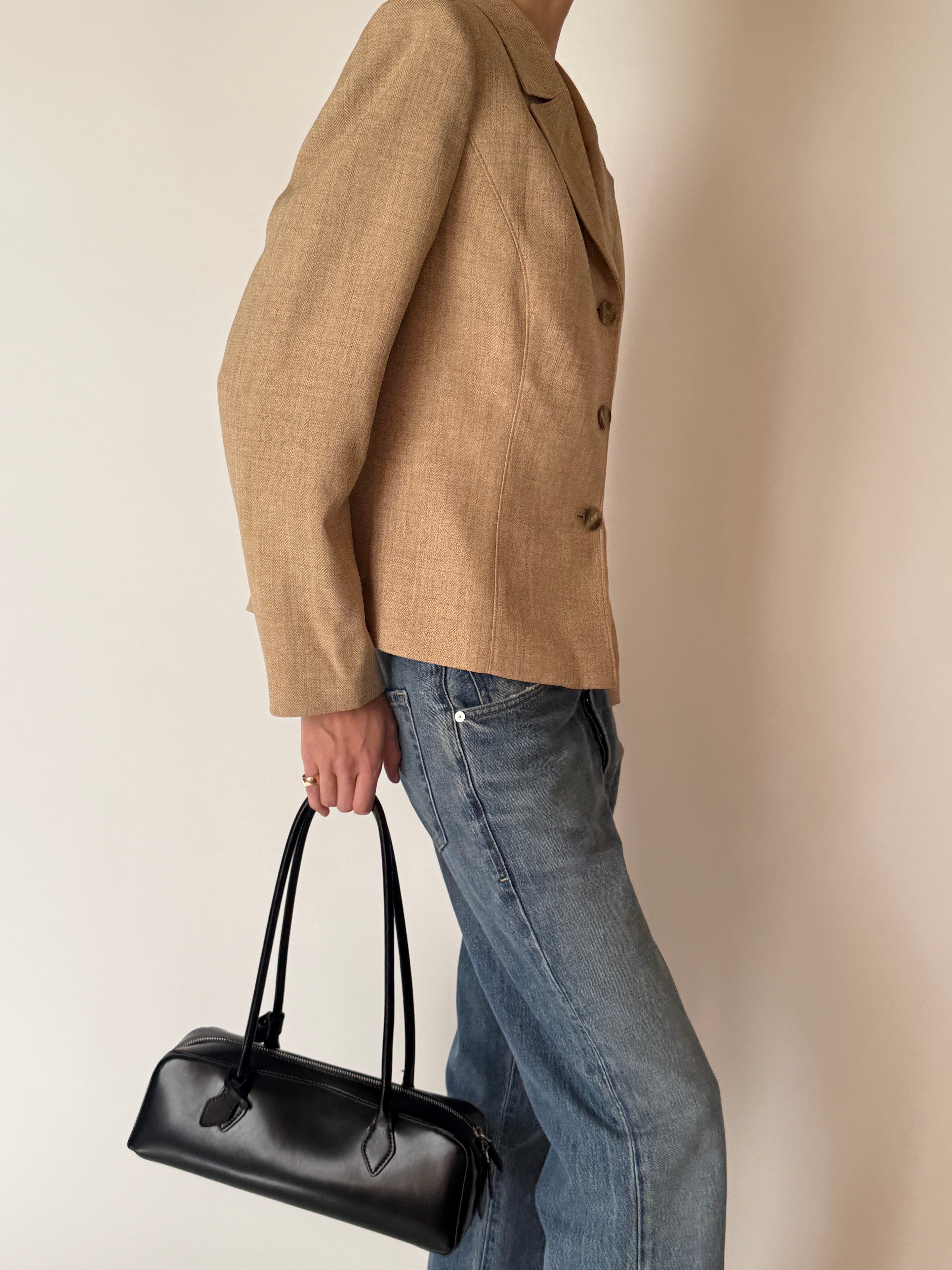 Side view of vintage tan tailored blazer